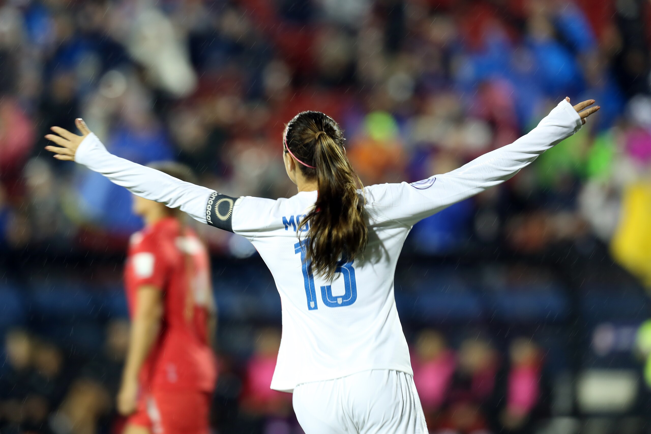 FRISCO, TX - OCTOBER 17: Captain of United States Alex Morgan celebrates after teammate Rose Lavelle (not in frame) scored a goal during a match between Canada and United States as part of CONCACAF Women's Championship at Toyota Stadium on October 17, 201