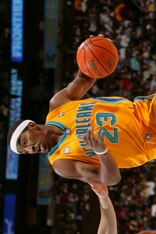 DENVER - NOVEMBER 30:  J.R. Smith #23 of the New Orleans/Oklahoma City Hornets drives against the Denver Nuggets November 30, 2005 at the Pepsi Center in Denver, Colorado. NOTE TO USER: User expressly acknowledges and agrees that, by downloading and/or us