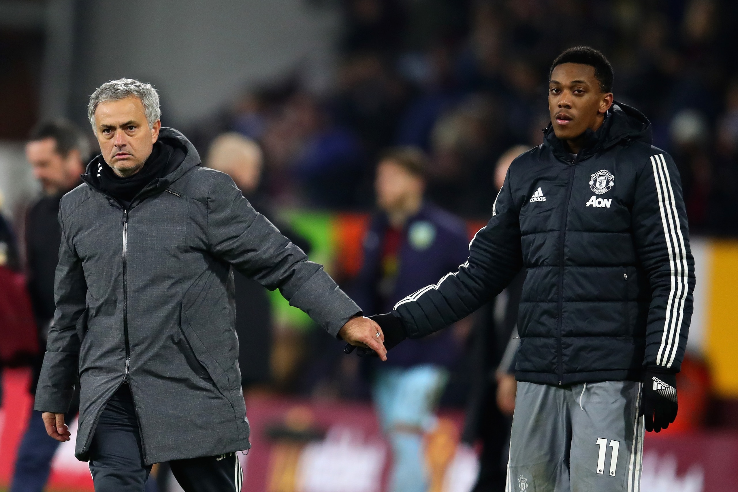 BURNLEY, ENGLAND - JANUARY 20:  Jose Mourinho, Manager of Manchester United shakes hands with goalscorer Anthony Martial of Manchester United after the Premier League match between Burnley and Manchester United at Turf Moor on January 20, 2018 in Burnley,