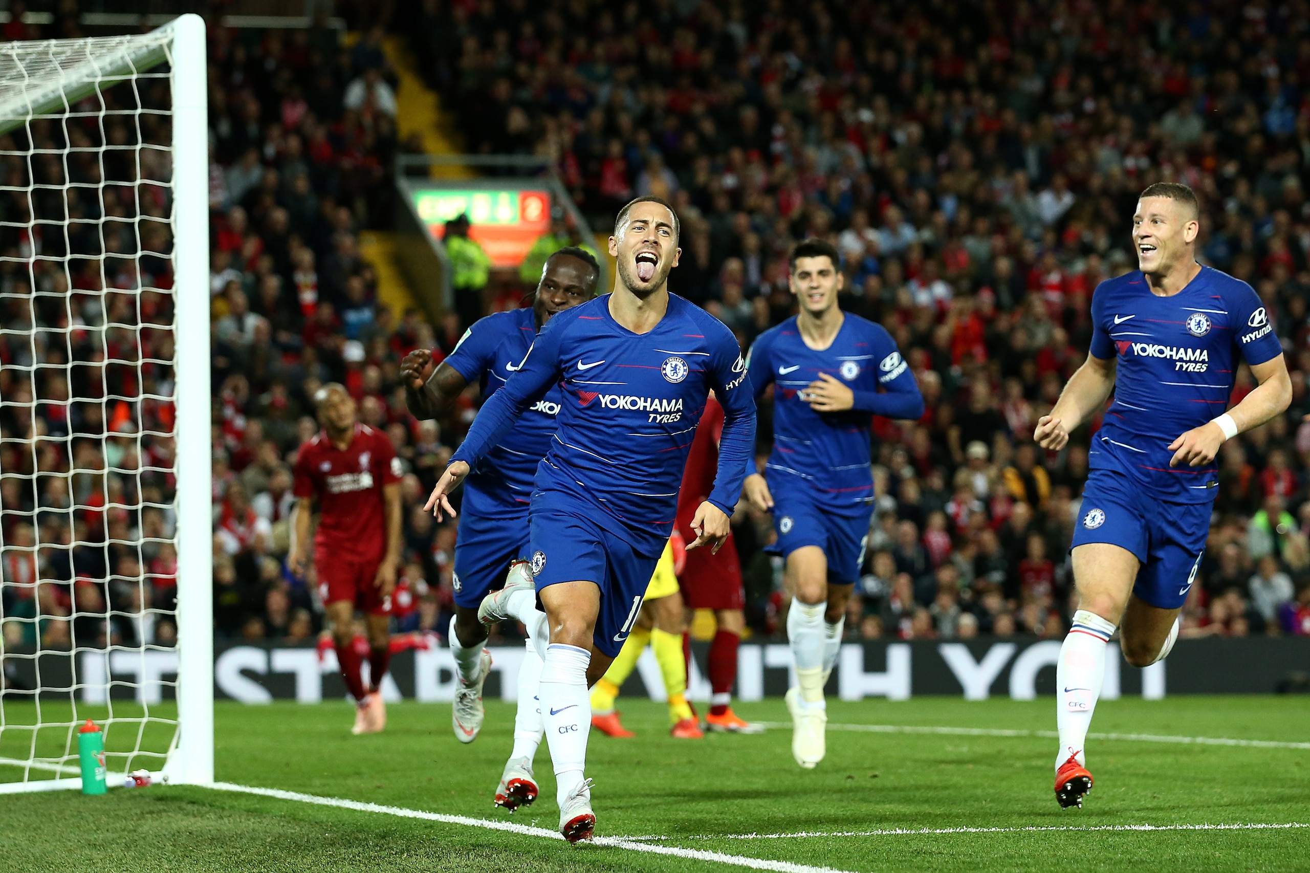 LIVERPOOL, ENGLAND - SEPTEMBER 26: Eden Hazard of Chelsea celebrates after he scores his side's second goal during the Carabao Cup Third Round match between Liverpool and Chelsea at Anfield on September 26, 2018 in Liverpool, England. (Photo by Jan Kruger