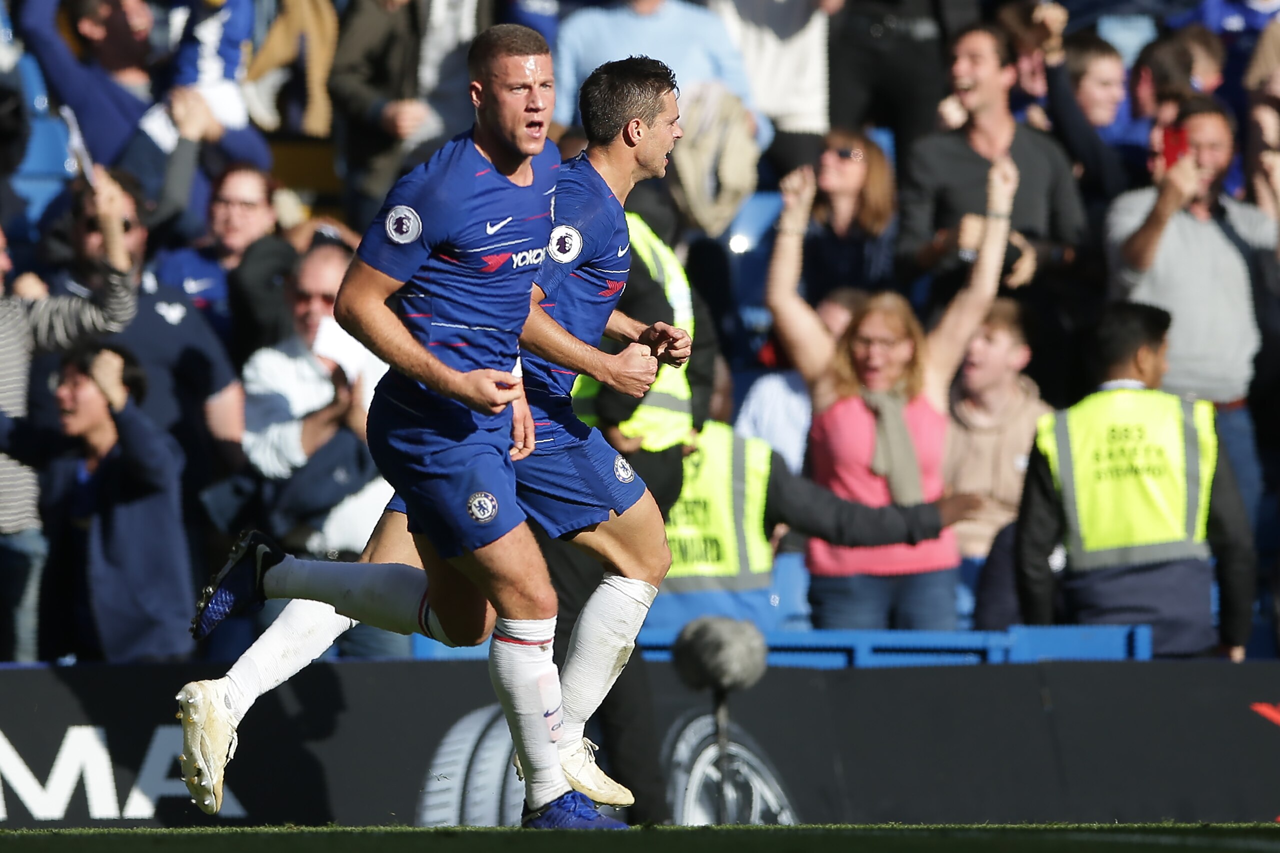 Chelsea's English midfielder Ross Barkley (L) celebrates after scoring their second goal during the English Premier League football match between Chelsea and Manchester United at Stamford Bridge in London on October 20, 2018. - The game finished 2-2. (Pho