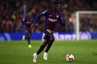 BARCELONA, SPAIN - OCTOBER 20: Ousmane Dembele of FC Barcelona runs with the ball during the La Liga match between FC Barcelona and Sevilla FC at Camp Nou on October 20, 2018 in Barcelona, Spain. (Photo by Alex Caparros/Getty Images)