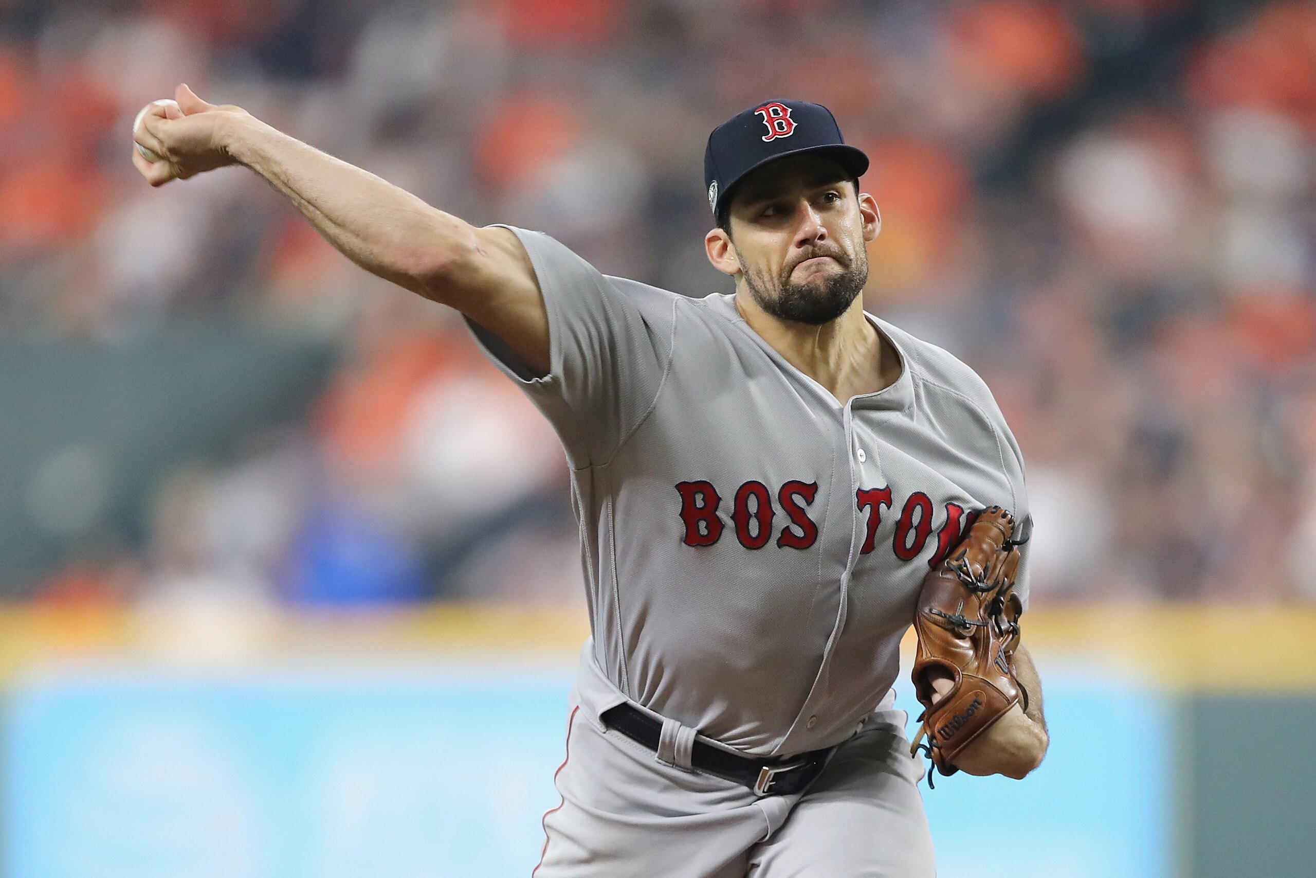 HOUSTON, TX - OCTOBER 16: Nathan Eovaldi #17 of the Boston Red Sox pitches in the first inning against the Houston Astros during Game Three of the American League Championship Series at Minute Maid Park on October 16, 2018 in Houston, Texas. (Photo by E HOUSTON, TX - OCTOBER 16: Nathan Eovaldi #17 of the Boston Red Sox pitches in the first inning against the Houston Astros during Game Three of the American League Championship Series at Minute Maid Park on October 16, 2018 in Houston, Texas. (Photo by E