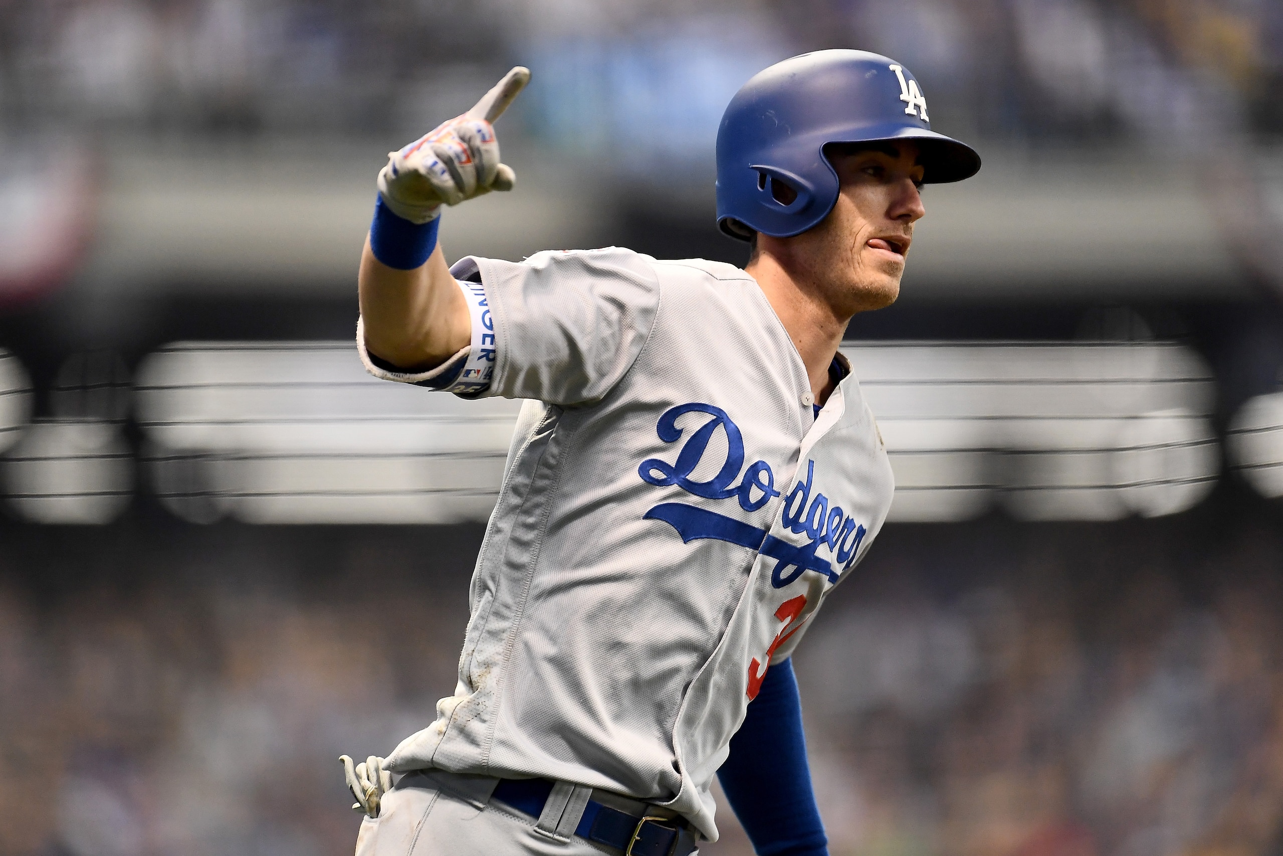 MILWAUKEE, WI - OCTOBER 20:  Cody Bellinger #35 of the Los Angeles Dodgers celebrates after hitting a two run home run against Jhoulys Chacin #45 of the Milwaukee Brewers during the second inning in Game Six of the National League Championship Series at M