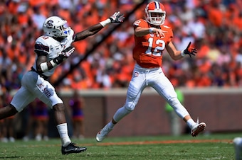 Darius Leonard pressures the Clemson quarterback.