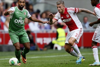 Samuel Armenteros of Feyenoord (L), Toby Alderweireld (R) during the Dutch Eredivisie between Ajax and Feyenoord at the Amsterdam Arena on august 18, 2013 in Amsterdam, The Netherlands (Photo by VI Images via Getty Images)