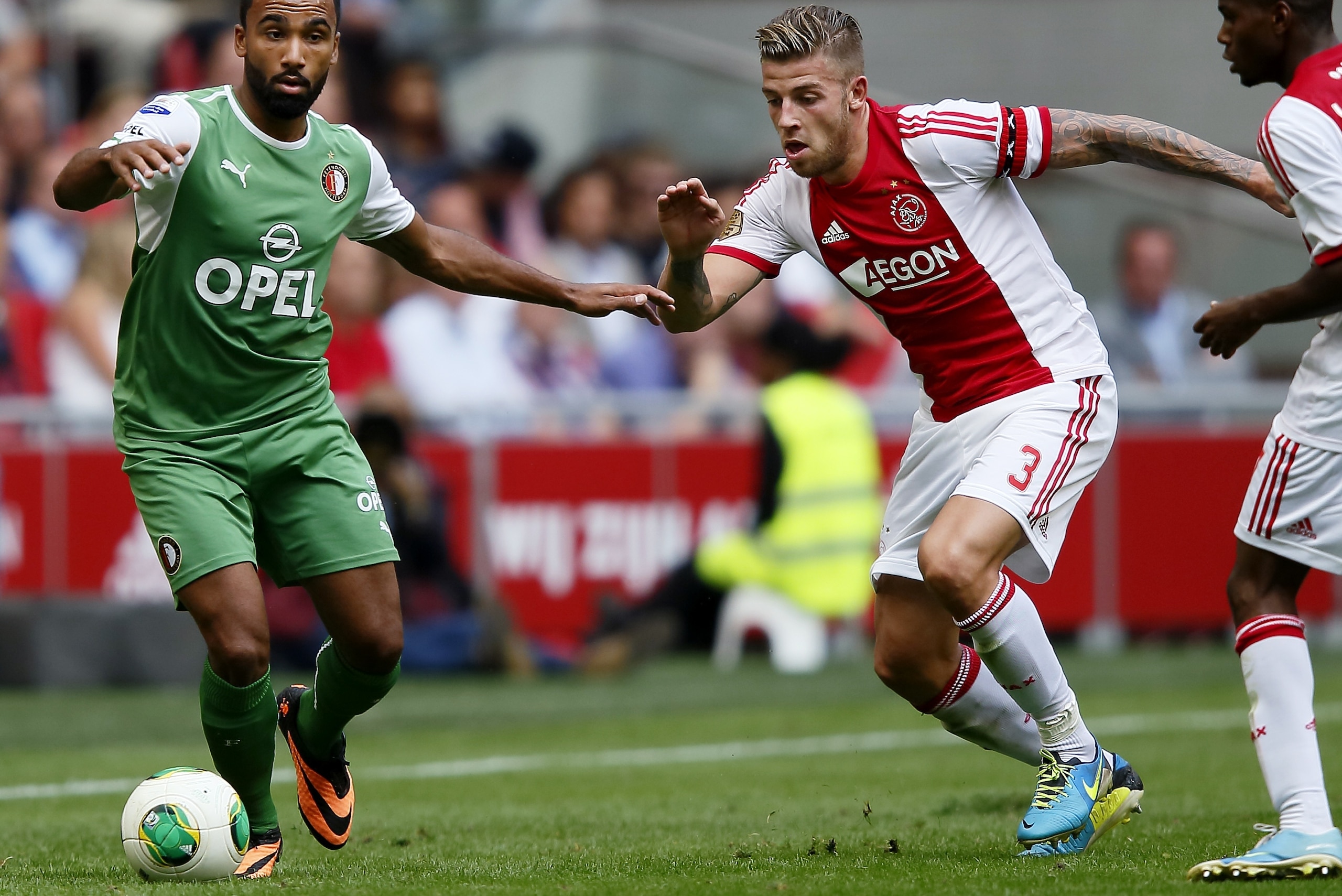 Samuel Armenteros of Feyenoord (L), Toby Alderweireld (R) during the Dutch Eredivisie between Ajax and Feyenoord at the Amsterdam Arena on august 18, 2013 in Amsterdam, The Netherlands (Photo by VI Images via Getty Images)
