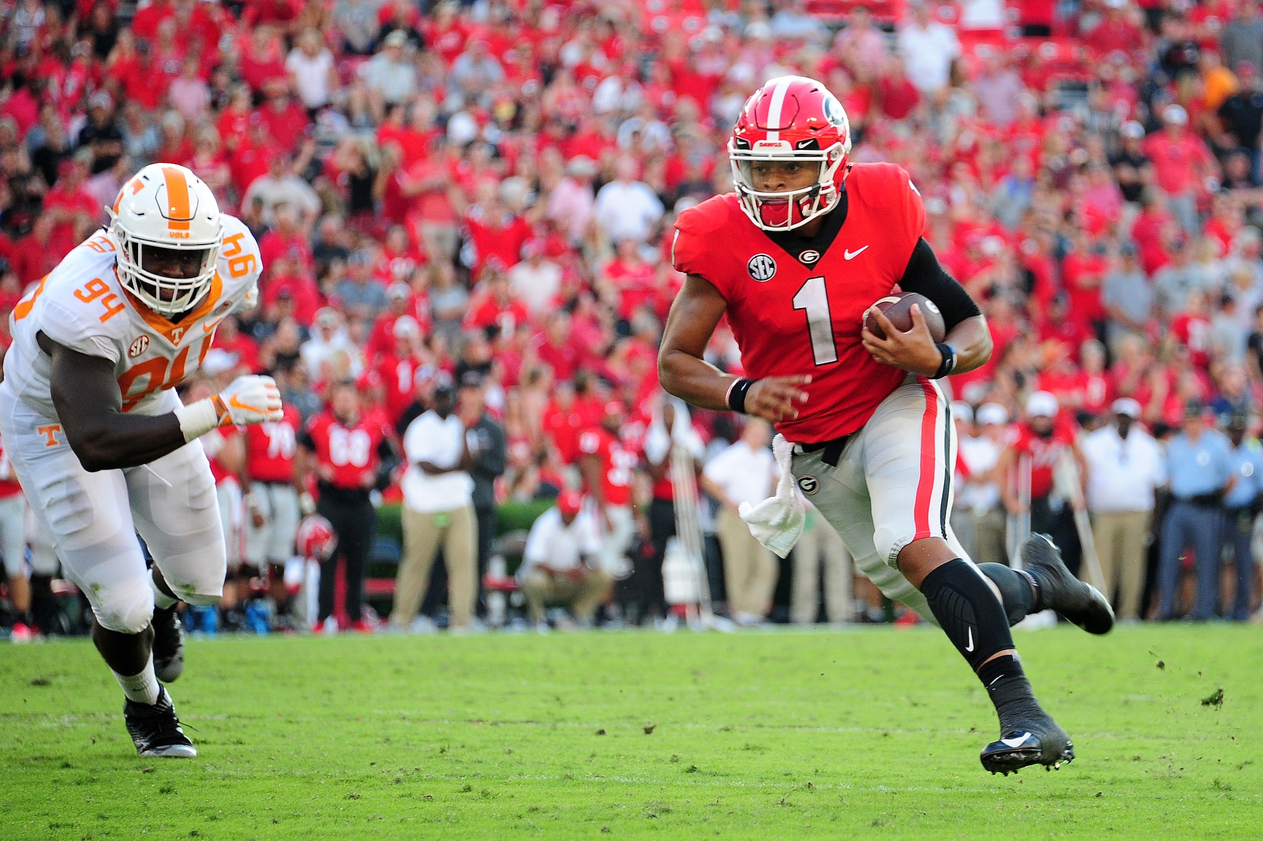ATHENS, GA - SEPTEMBER 29: Justin Fields #1 of the Georgia Bulldogs runs the ball against the Tennessee Volunteers on September 29, 2018 at Sanford Stadium in Athens, Georgia. (Photo by Scott Cunningham/Getty Images)