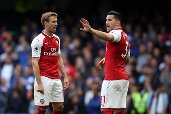 LONDON, ENGLAND - SEPTEMBER 17: Nacho Monreal of Arsenal talks to Sead Kolasinac of Arsenal during the Premier League match between Chelsea and Arsenal at Stamford Bridge on September 17, 2017 in London, England. (Photo by Catherine Ivill - AMA/Getty Imag