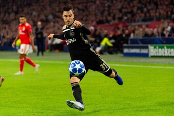 AMSTERDAM, NETHERLANDS - OCTOBER 23: Nicolas Tagliafico of Ajax controls the ball during the UEFA Champions League Group E match between Ajax and SL Benfica at Johan Cruyff Arena on October 23, 2018 in Amsterdam, Netherlands. (Photo by TF-Images/Getty Ima