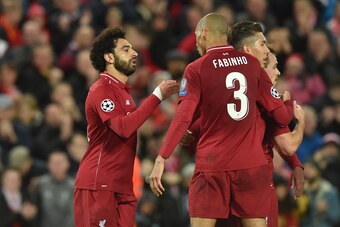 LIVERPOOL, ENGLAND - OCTOBER 24: Mohamed Salah of Liverpool celebrates his goal with team mates during the UEFA Champions League Group C match between Liverpool and FK Crvena Zvezda at Anfield on October 24, 2018 in Liverpool, United Kingdom. (Photo by TF