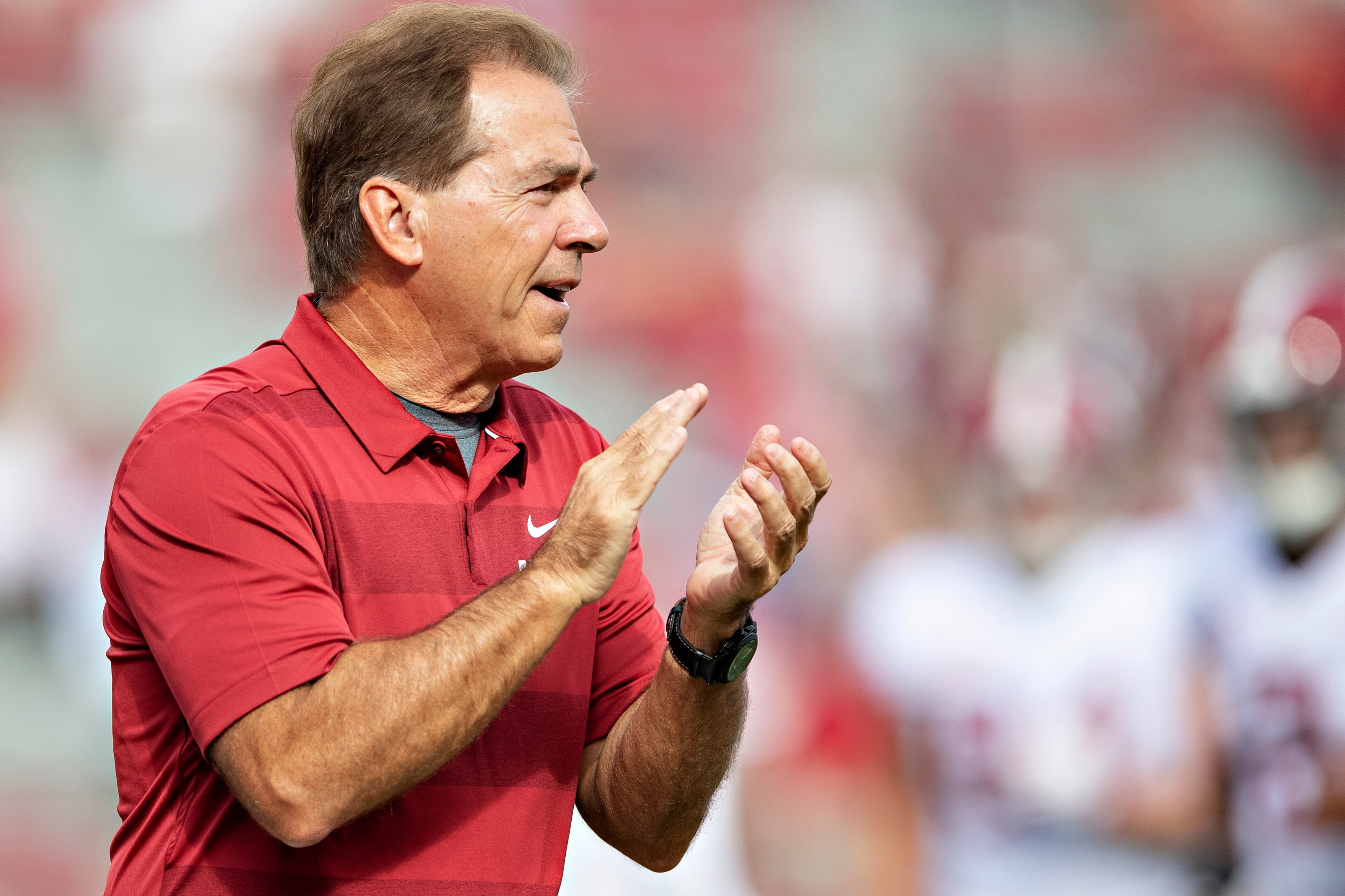 FAYETTEVILLE, AR - OCTOBER 6:  Head Coach Nick Saban of the Alabama Crimson Tide with his team on the field before a game against the Arkansas Razorbacks at Razorback Stadium on October 6, 2018 in Tuscaloosa, Alabama.  The Crimson Tide defeated the Razorb
