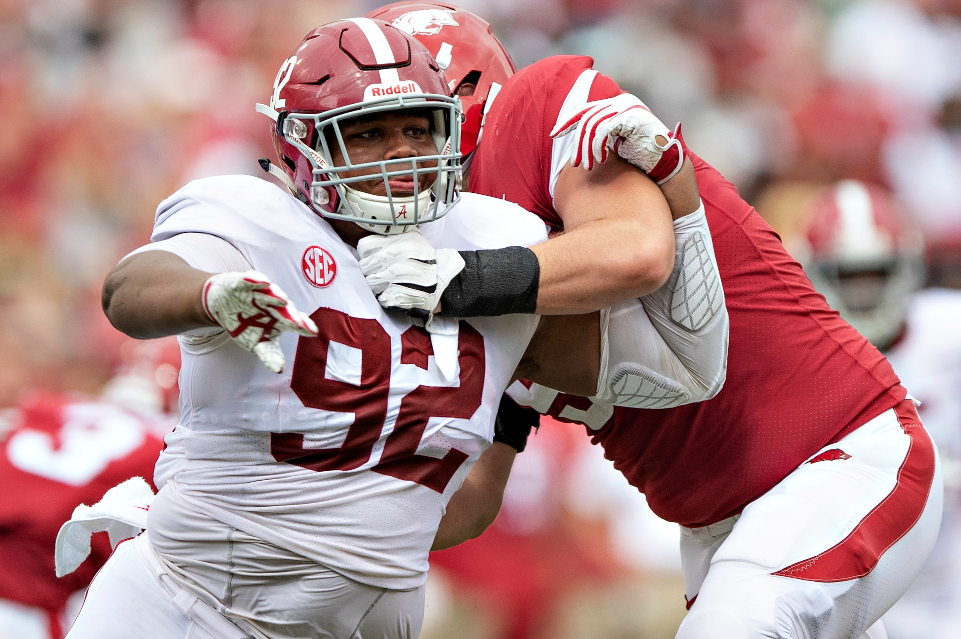 FAYETTEVILLE, AR - OCTOBER 6:  Quinnen Williams #92 of the Alabama Crimson Tide rushes the quarterback during a game against the Arkansas Razorbacks at Razorback Stadium on October 6, 2018 in Tuscaloosa, Alabama.  The Crimson Tide defeated the Razorbacks 