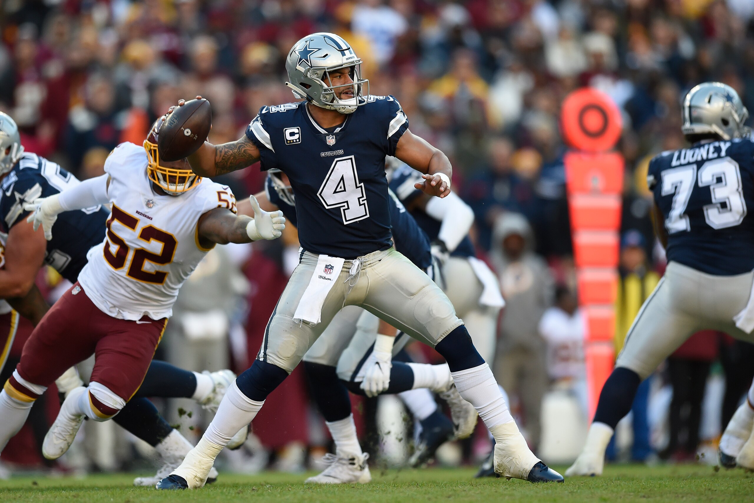 LANDOVER, MD - OCTOBER 21: Quarterback Dak Prescott #4 of the Dallas Cowboys throws a pass in the second quarter against the Washington Redskins at FedExField on October 21, 2018 in Landover, Maryland. (Photo by Patrick McDermott/Getty Images)