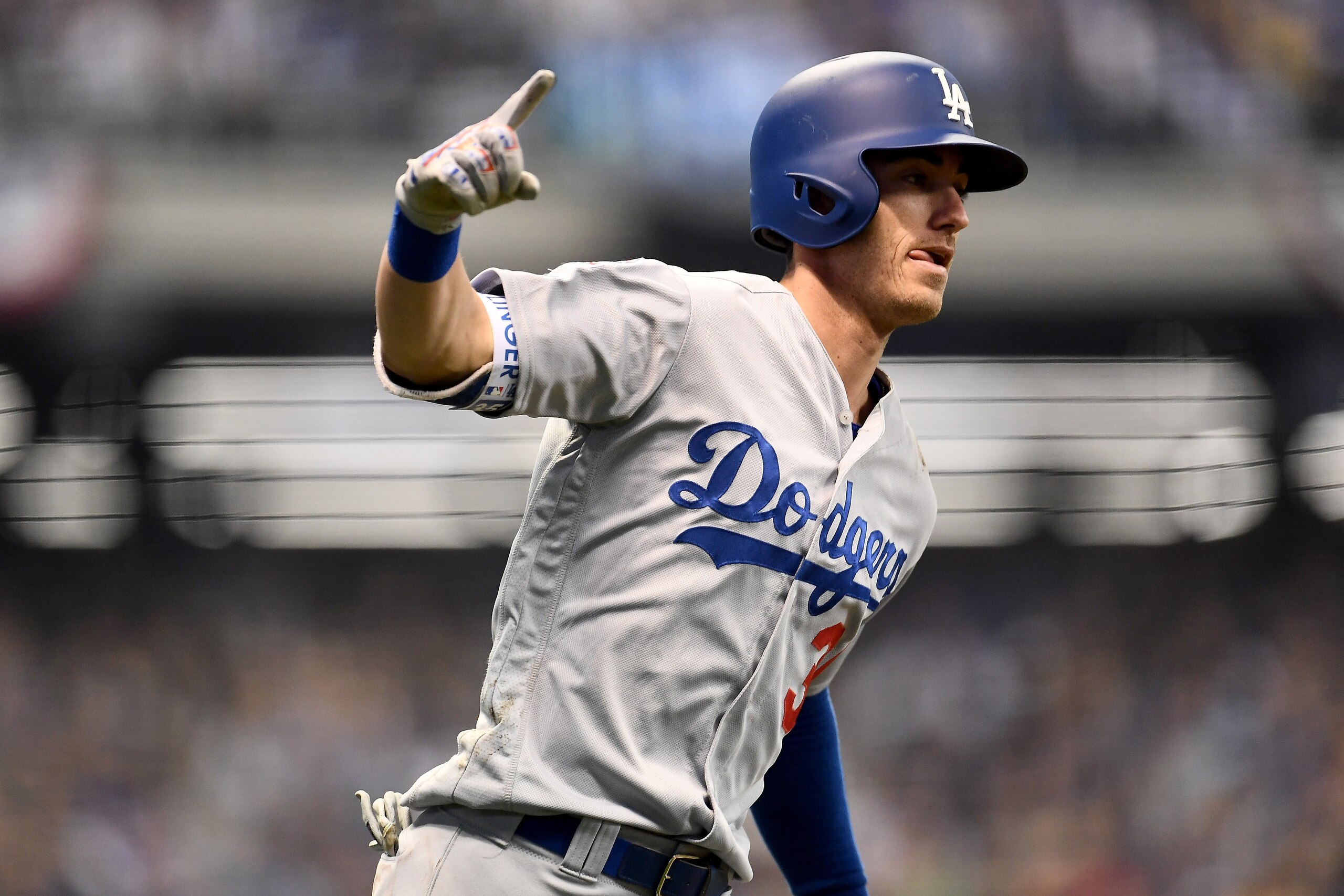 MILWAUKEE, WI - OCTOBER 20:  Cody Bellinger #35 of the Los Angeles Dodgers celebrates after hitting a two run home run against Jhoulys Chacin #45 of the Milwaukee Brewers during the second inning in Game Six of the National League Championship Series at M