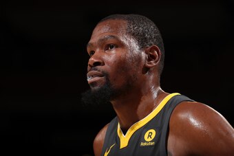 NEW YORK, NY - FEBRUARY 26:  Kevin Durant #35 of the Golden State Warriors looks on during the game against the New York Knicks on February 26, 2018 at Madison Square Garden in New York City, New York.  NOTE TO USER: User expressly acknowledges and agrees