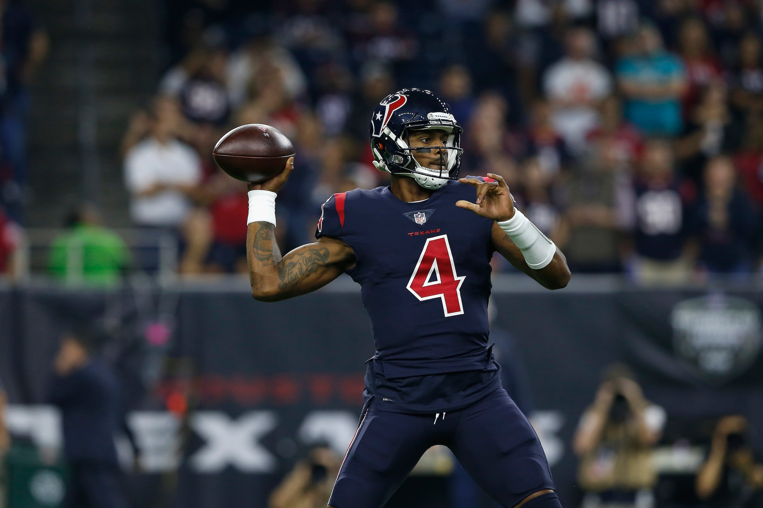HOUSTON, TX - OCTOBER 25:  Deshaun Watson #4 of the Houston Texans sets up to pass against the Miami Dolphins in the first quarter at NRG Stadium on October 25, 2018 in Houston, Texas.  (Photo by Tim Warner/Getty Images)