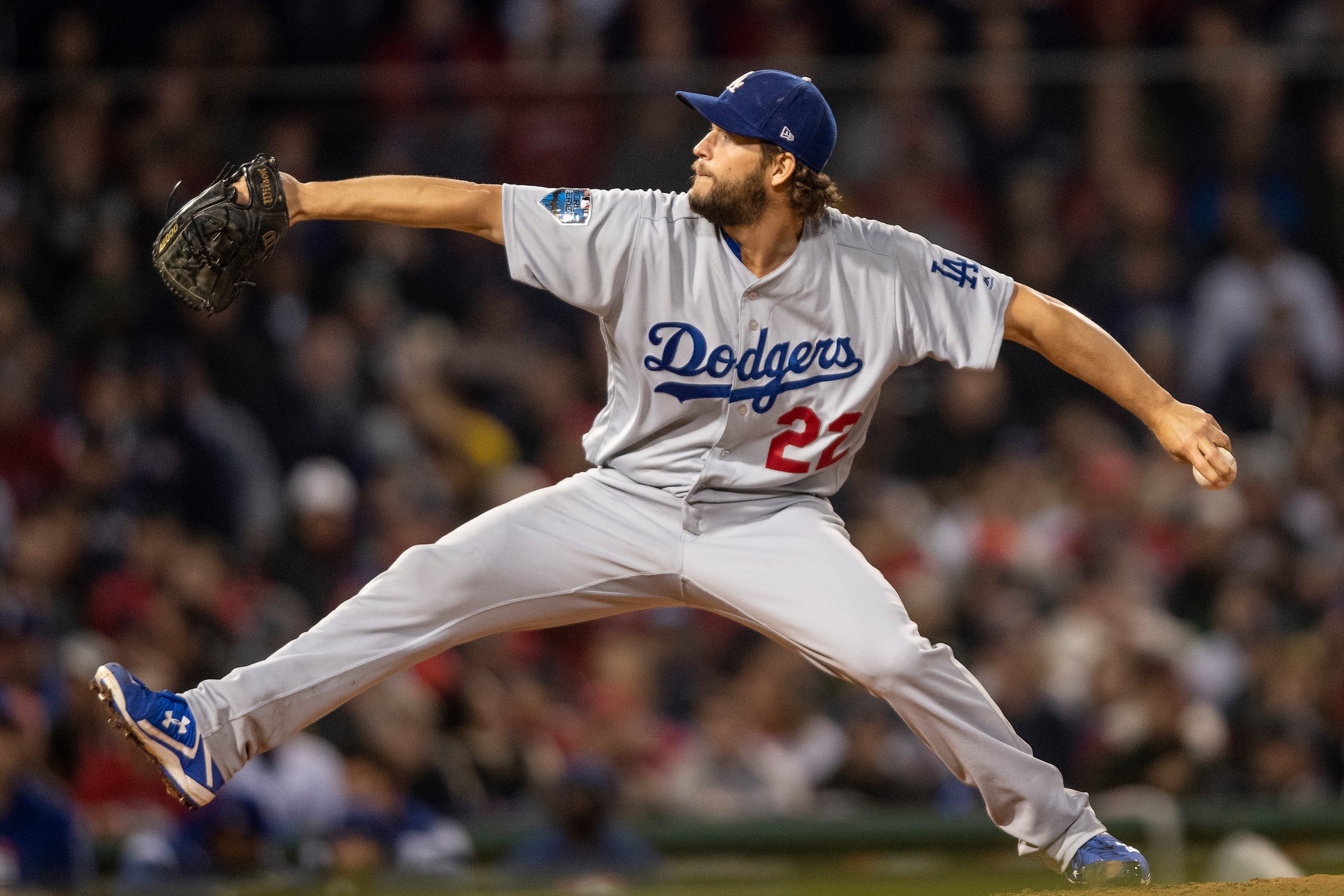 BOSTON, MA - OCTOBER 23: Clayton Kershaw #27 of the Los Angeles Dodgers delivers during the third inning of game one of the 2018 World Series against the Boston Red Sox on October 23, 2018 at Fenway Park in Boston, Massachusetts. (Photo by Billie Weiss/Bo