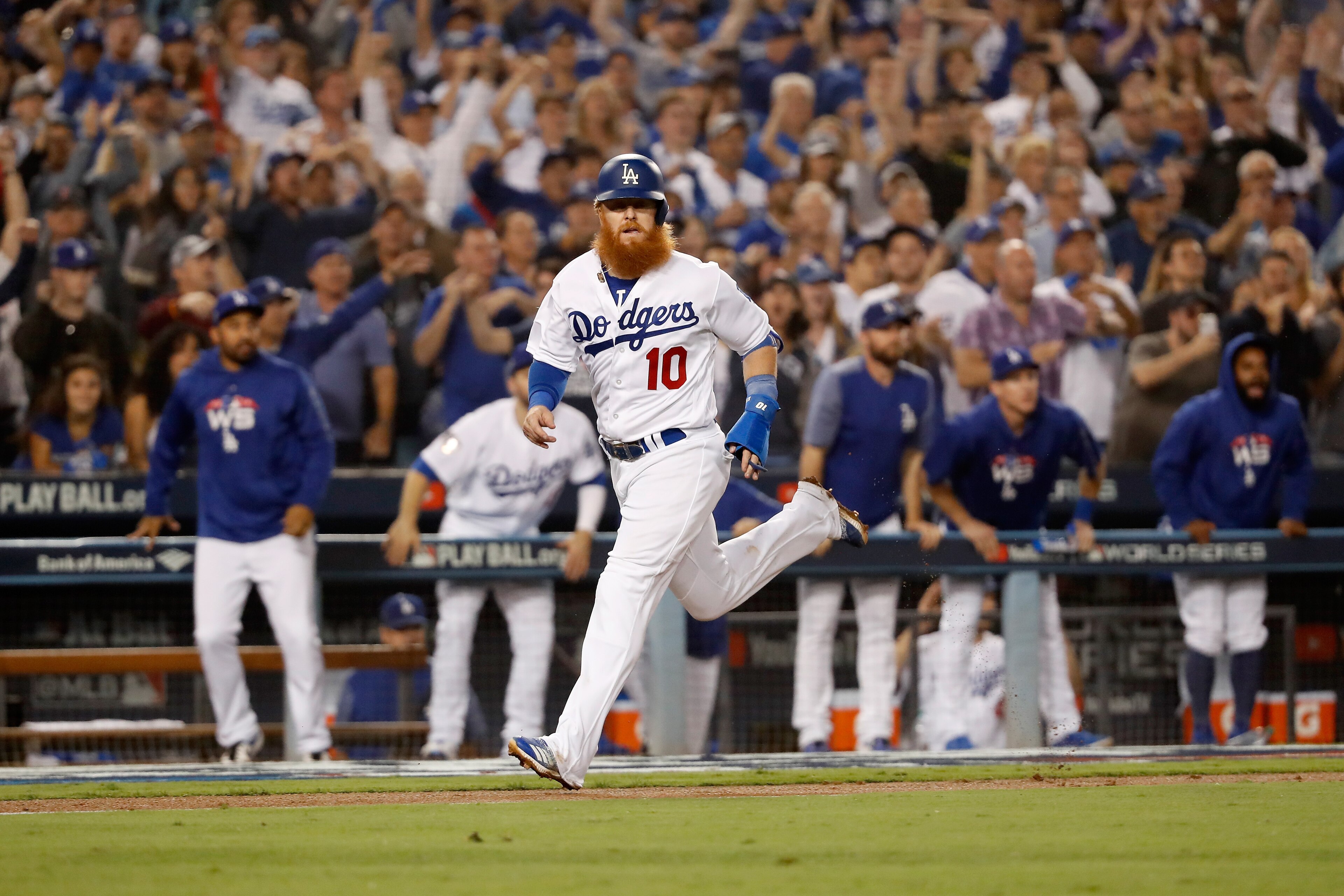 LOS ANGELES, CA - OCTOBER 27:  Justin Turner #10 of the Los Angeles Dodgers runs home to score in the sixth inning of Game Four of the 2018 World Series against the Boston Red Sox at Dodger Stadium on October 27, 2018 in Los Angeles, California.  (Photo b