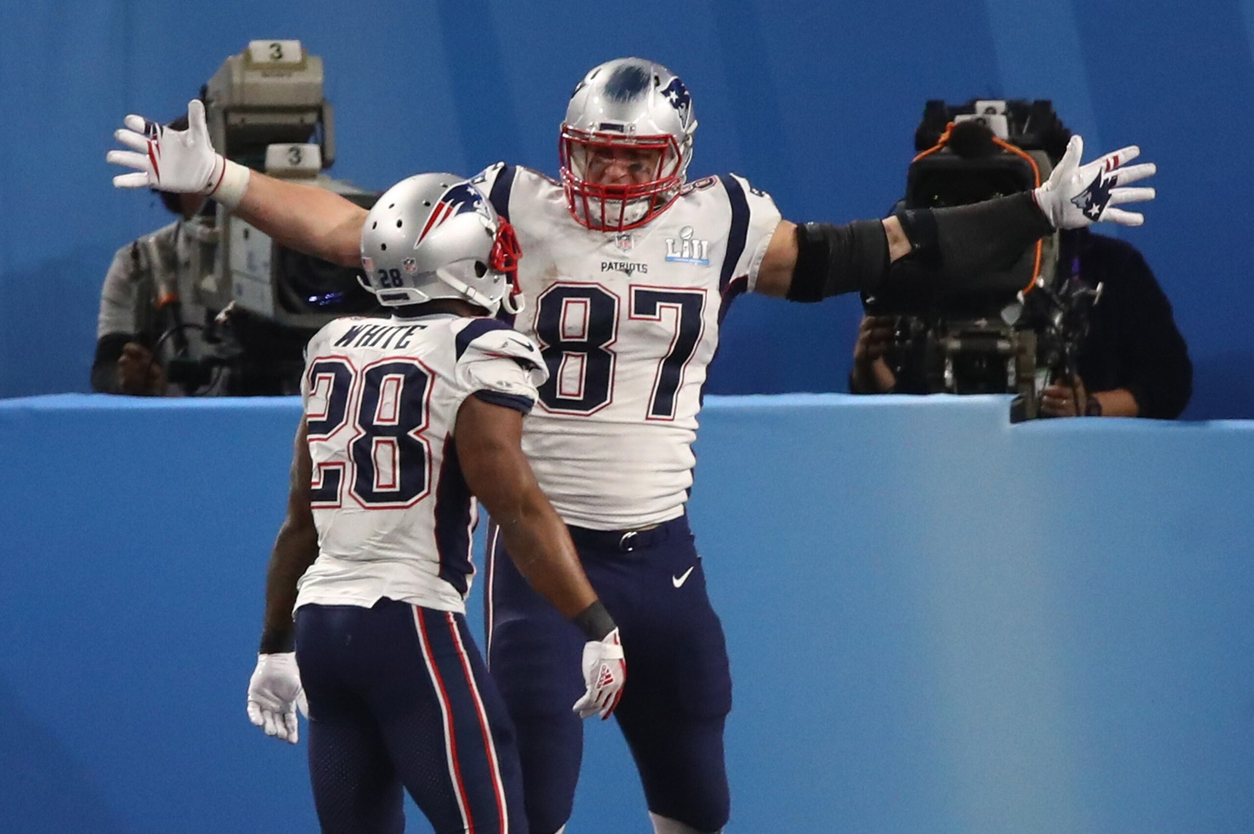 MINNEAPOLIS, MN - FEBRUARY 04:  Rob Gronkowski #87 of the New England Patriots celebrates his four yard touchdown catch with teammates James White #28 during the third quarter against the Philadelphia Eagles in Super Bowl LII at U.S. Bank Stadium on Febru