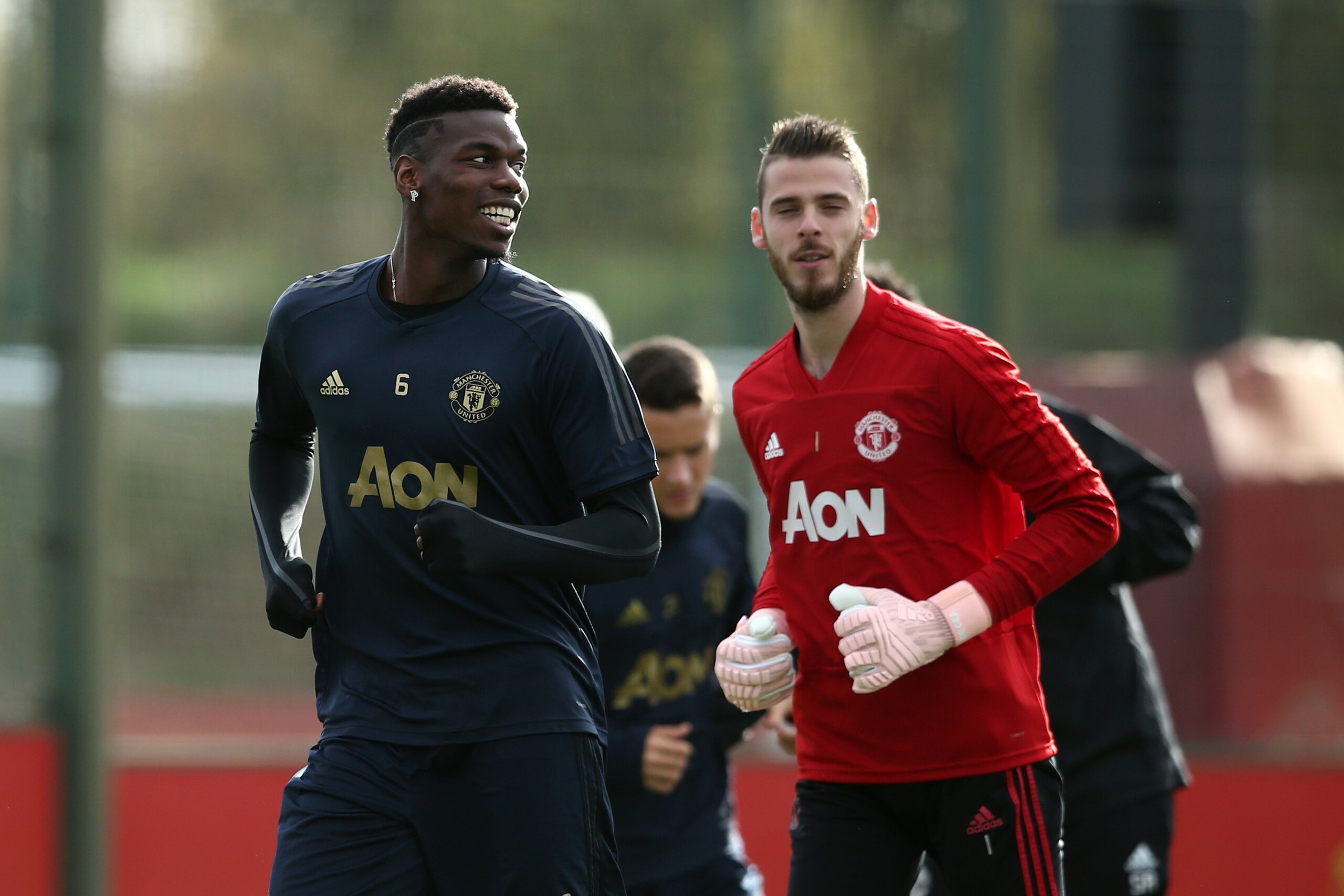 MANCHESTER, ENGLAND - OCTOBER 22:  Paul Pogba  and David De Gea of Manchester United warm up during a training session ahead of their UEFA Champions League Group H match against Juventus at Aon Training Complex on October 22, 2018 in Manchester, England. 
