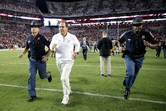 TUSCALOOSA, AL - OCTOBER 13: Head coach Nick Saban of the Alabama Crimson Tide runs off the field after the game against the Missouri Tigers at Bryant-Denny Stadium on October 13, 2018 in Tuscaloosa, Alabama. Alabama won 39-10. (Photo by Joe Robbins/Getty