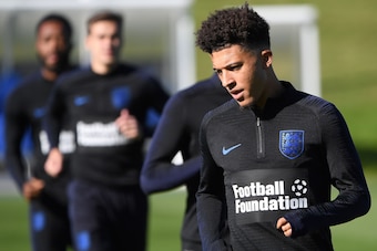 England's midfielder Jadon Sancho (R) attends an open training session at St George's Park in Burton-on-Trent, central England on October 9, 2018 ahead of their UEFA Nations League match against Croatia on October 12. (Photo by Paul ELLIS / AFP) / NOT FOR