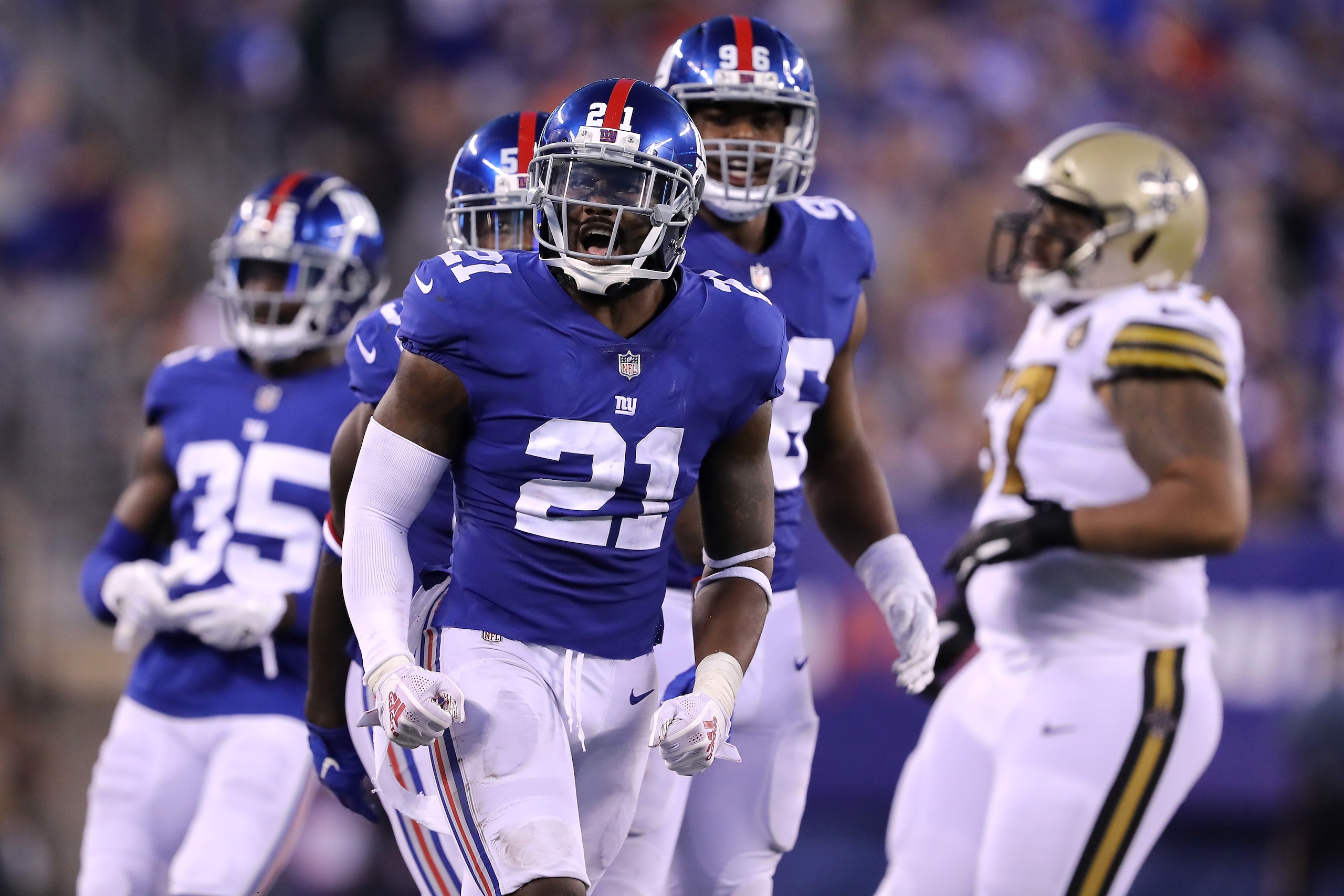 EAST RUTHERFORD, NJ - SEPTEMBER 30:  Landon Collins #21 of the New York Giants celebrates at MetLife Stadium on September 30, 2018 in East Rutherford, New Jersey.  (Photo by Elsa/Getty Images)