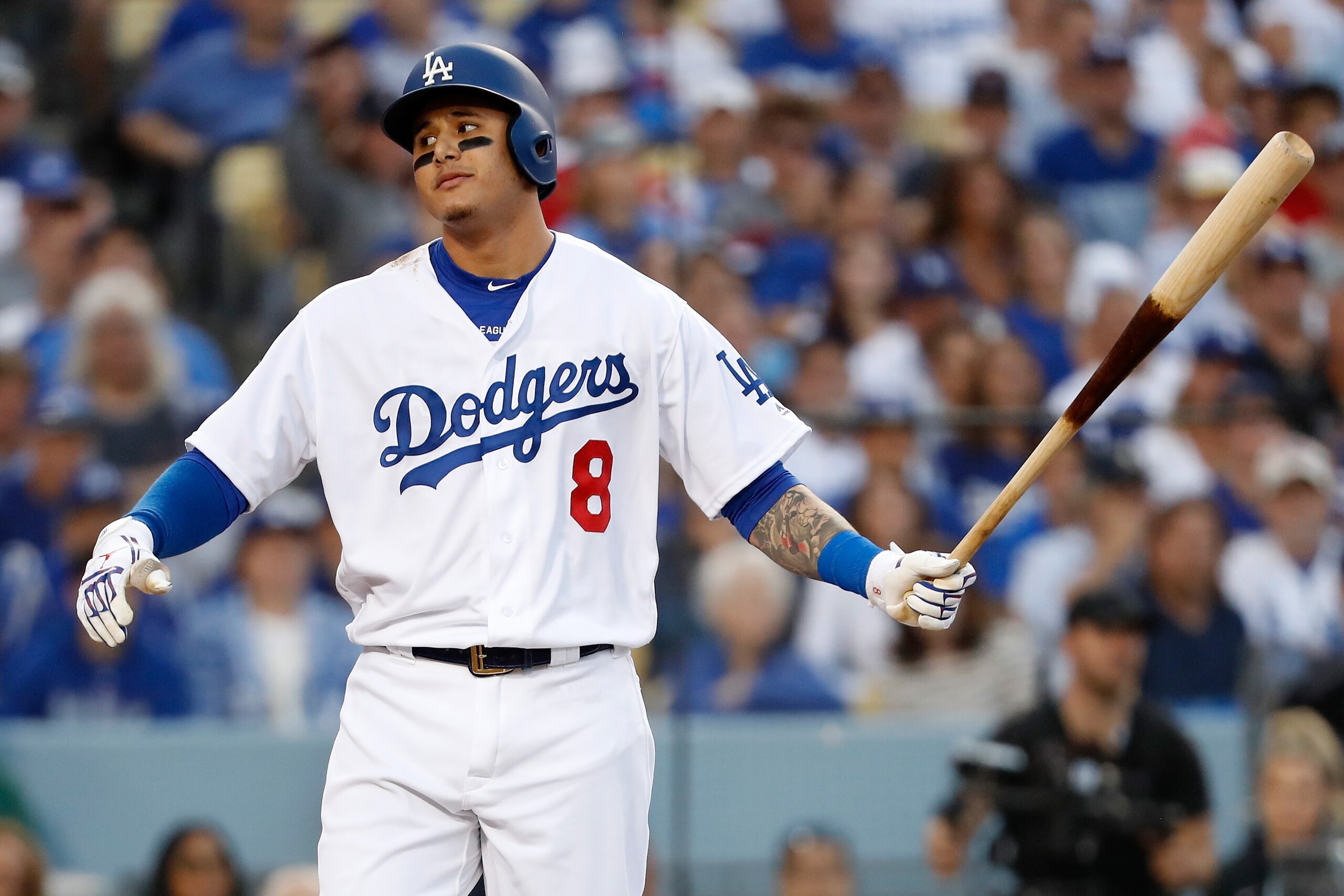 LOS ANGELES, CA - OCTOBER 28:  Manny Machado #8 of the Los Angeles Dodgers reacts to his first inning strike out against the Boston Red Sox in Game Five of the 2018 World Series at Dodger Stadium on October 28, 2018 in Los Angeles, California.  (Photo by 
