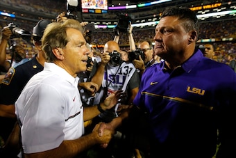 BATON ROUGE, LA - NOVEMBER 05:  Head coach Nick Saban of the Alabama Crimson Tide shakes hands with head coach Ed Orgeron of the LSU Tigers after their 10-0 win at Tiger Stadium on November 5, 2016 in Baton Rouge, Louisiana.  (Photo by Kevin C. Cox/Getty 