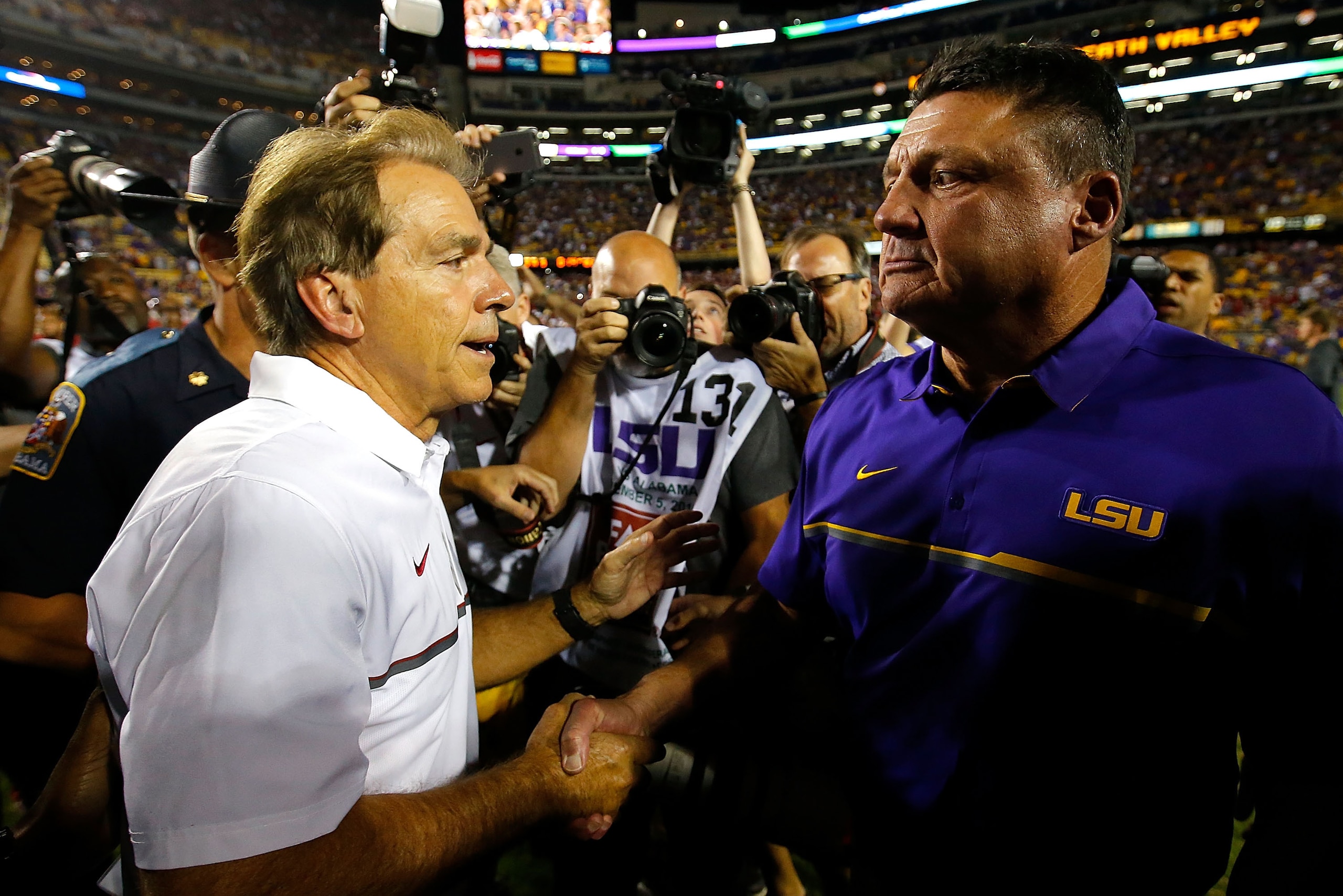 BATON ROUGE, LA - NOVEMBER 05: Head coach Nick Saban of the Alabama Crimson Tide shakes hands with head coach Ed Orgeron of the LSU Tigers after their 10-0 win at Tiger Stadium on November 5, 2016 in Baton Rouge, Louisiana. (Photo by Kevin C. Cox/Getty BATON ROUGE, LA - NOVEMBER 05: Head coach Nick Saban of the Alabama Crimson Tide shakes hands with head coach Ed Orgeron of the LSU Tigers after their 10-0 win at Tiger Stadium on November 5, 2016 in Baton Rouge, Louisiana. (Photo by Kevin C. Cox/Getty