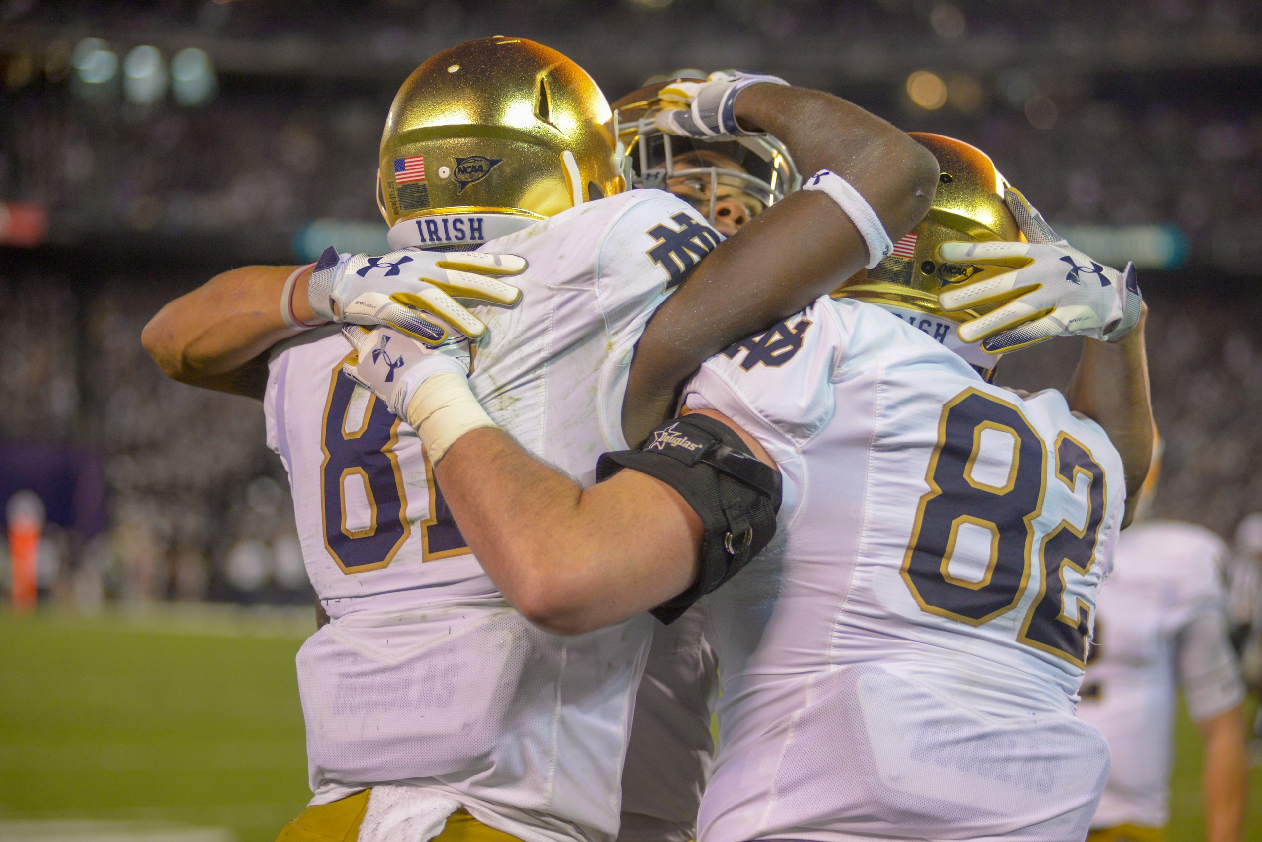 SAN DIEGO, CA - OCTOBER 27:  Miles Boykin #81, with Nic Weishar #82 and Chase Claypool #83, of the Notre Dame Fighting Irish celebrate after scoring a touchdown in the 1st half against the Navy Midshipmen at SDCCU Stadium on October 27, 2018 in San Diego,