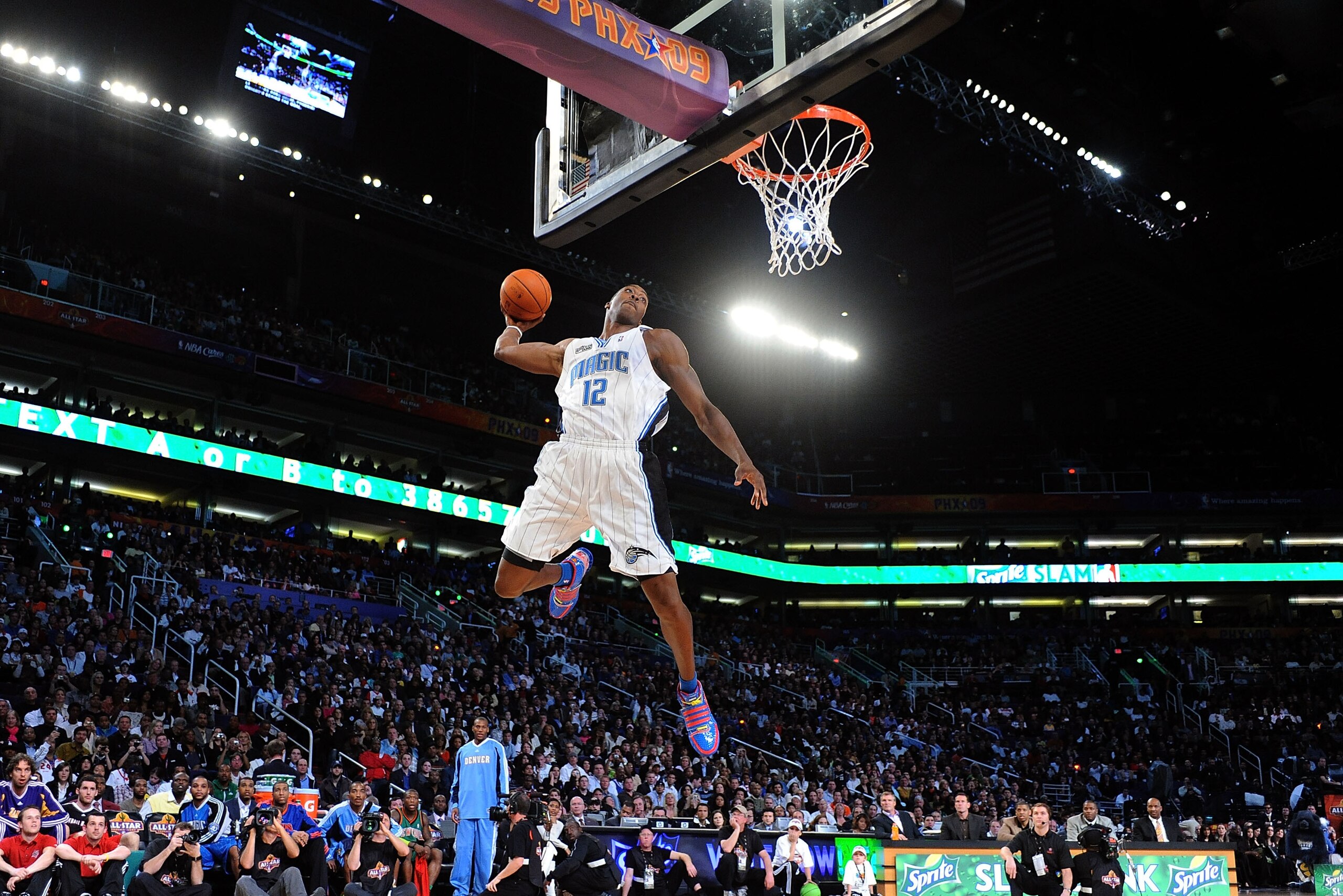 PHOENIX - FEBRUARY 14:  Dwight Howard #12 of the Orlando Magic participates in the Sprite Slam Dunk Contest on All-Star Saturday Night, part of 2009 NBA All-Star Weekend at US Airways Center on February 14, 2009 in Phoenix, Arizona.  NOTE TO USER: User ex