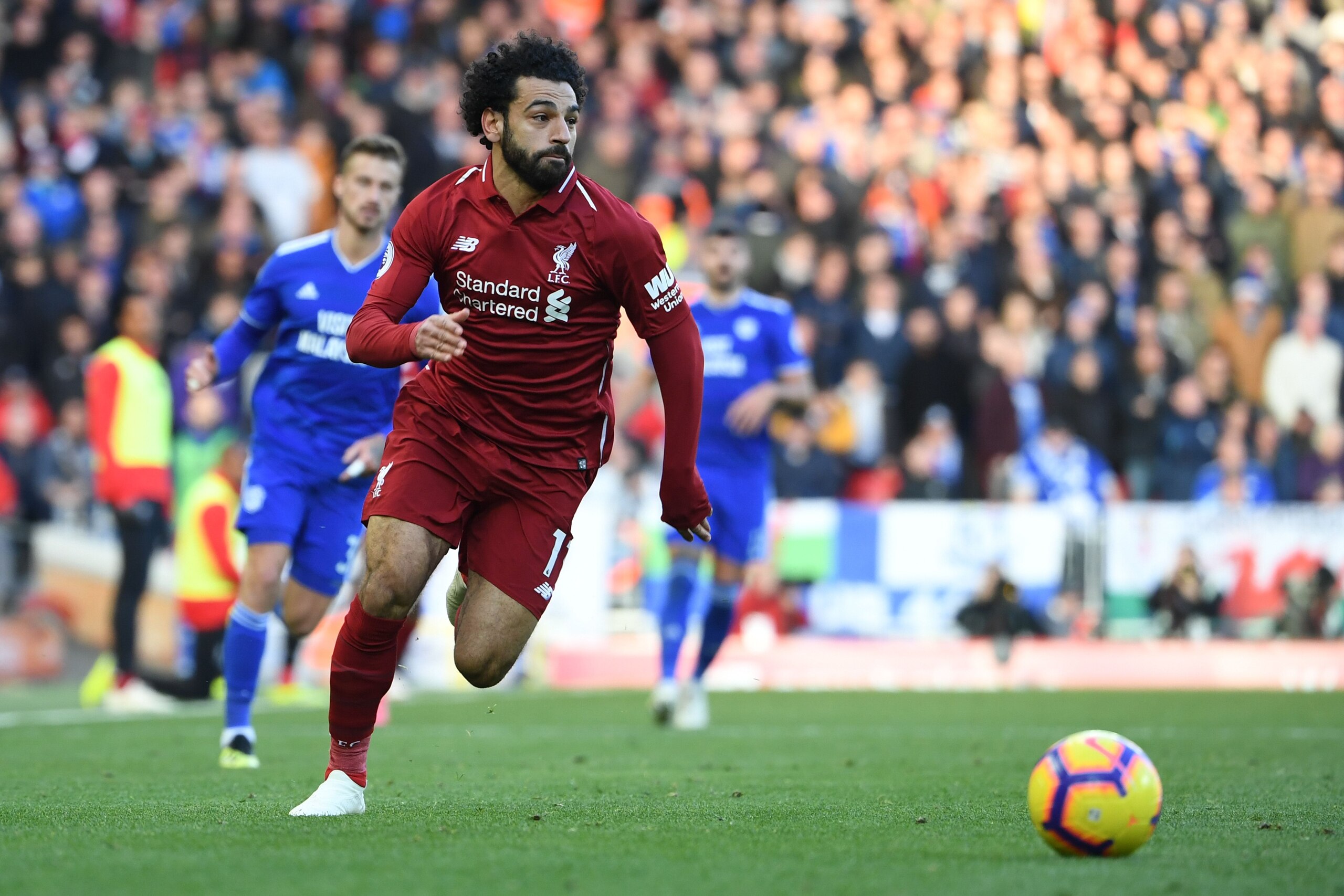 Liverpool's Egyptian midfielder Mohamed Salah runs with the ball during the English Premier League football match between Liverpool and Cardiff City at Anfield in Liverpool, north west England on October 27, 2018. (Photo by Paul ELLIS / AFP) / RESTRICTED 