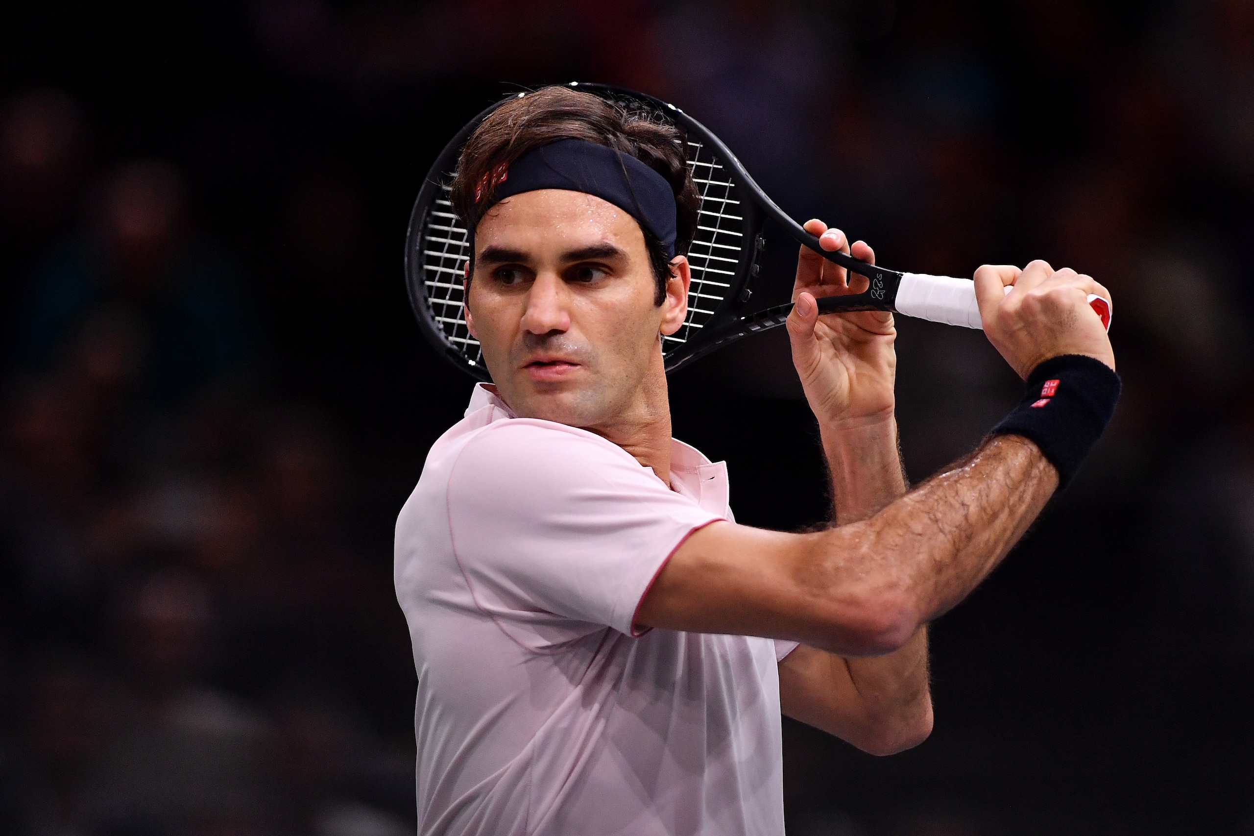 PARIS, FRANCE - NOVEMBER 01:  Roger Federer of Switzerland plays a backhand in his Round of 16 match against Fabio Fognini of Italy during Day 4 of the Rolex Paris Masters on November 1, 2018 in Paris, France. (Photo by Justin Setterfield/Getty Images)