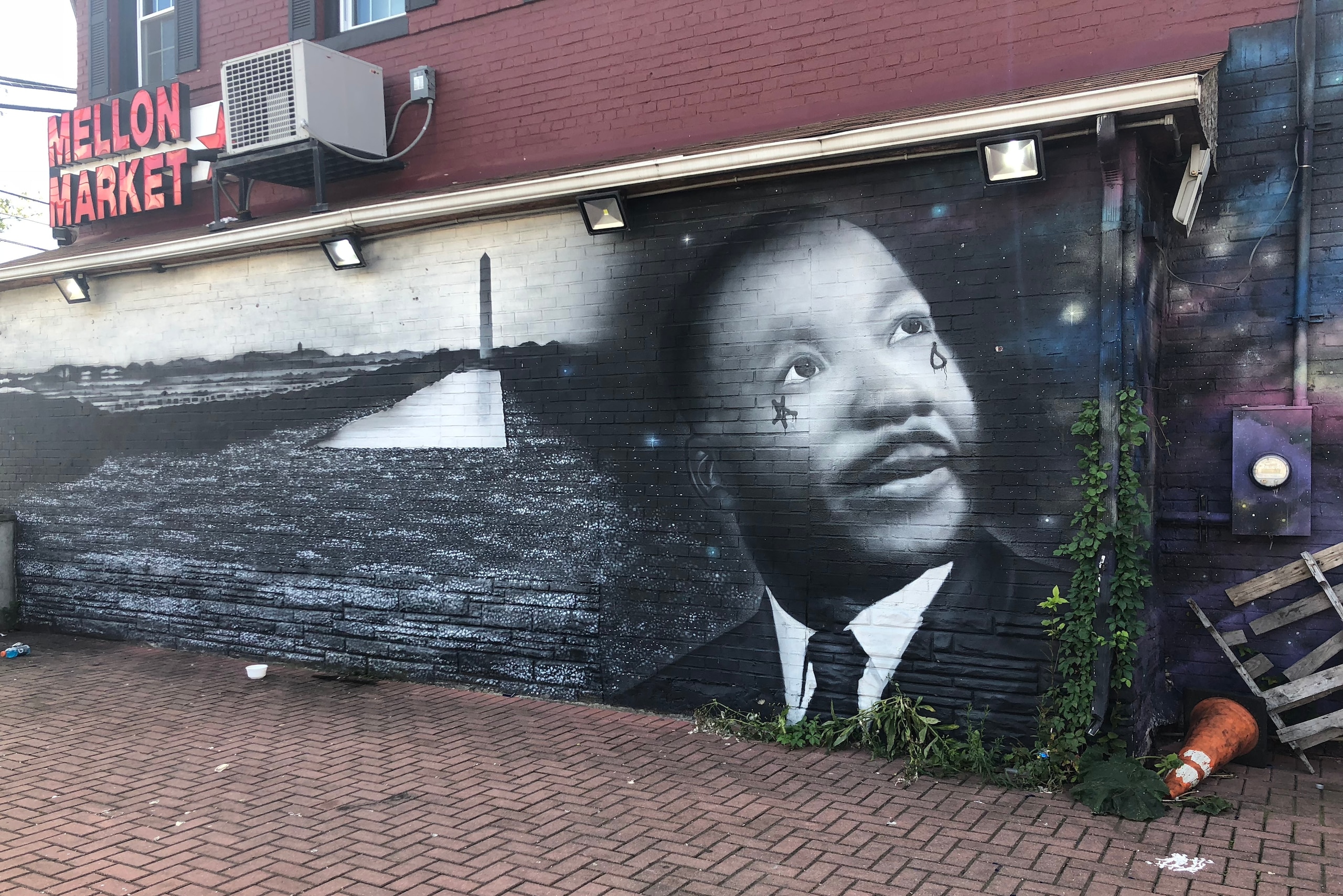 A mural of Martin Luther King, Jr. adorns the side of a market in a neighborhood of Southeast Washington, D.C. A mural of Martin Luther King, Jr. adorns the side of a market in a neighborhood of Southeast Washington, D.C.