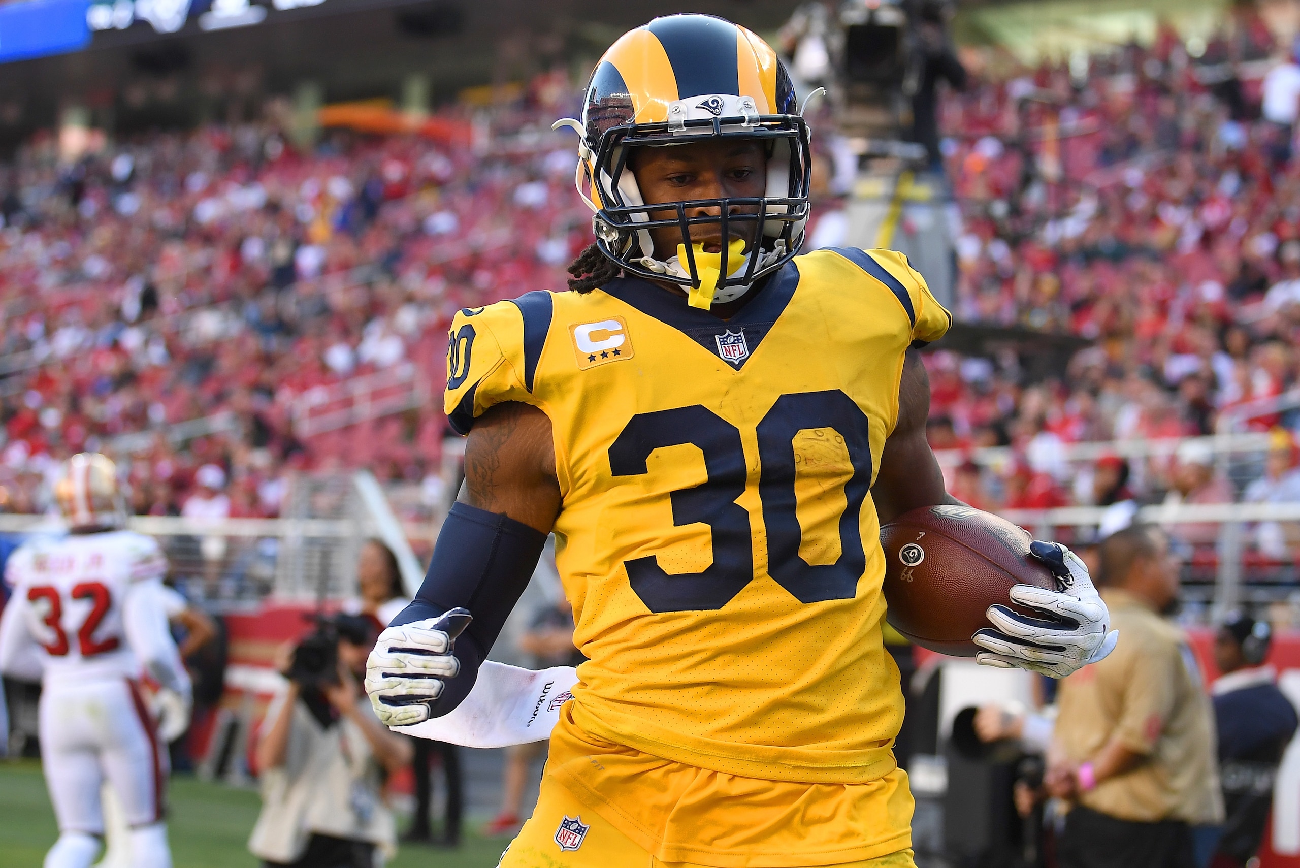 SANTA CLARA, CA - OCTOBER 21:  Todd Gurley #30 of the Los Angeles Rams carries the ball for a 12 yard touchdown run against the San Francisco 49ers during the fourth quarter of an NFL football game at Levi's Stadium on October 21, 2018 in Santa Clara, Cal