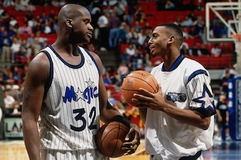 ORLANDO, FL - JANUARY 14:  Shaquille O'Neal #32, and Anfernee Hardaway #1 of the Orlando Magic talk on the court prior to their game against the Philadelphia 76ers played at the Orlando Arena on January 14, 1995 in Orlando, Florida. NOTE TO USER: User exp