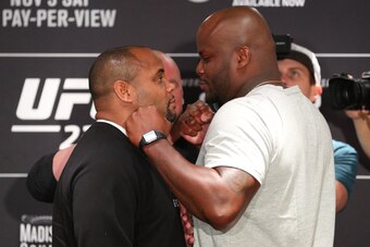 NEW YORK, NY - NOVEMBER 1: (L-R) UFC light heavyweight and heavyweight champion Daniel Cormier and Derrick Lewis pose for media during the UFC 230 ultimate media day at the New York Marriott Marquis on November 1, 2018 in New York, NY.  (Photo by Ed Mulho