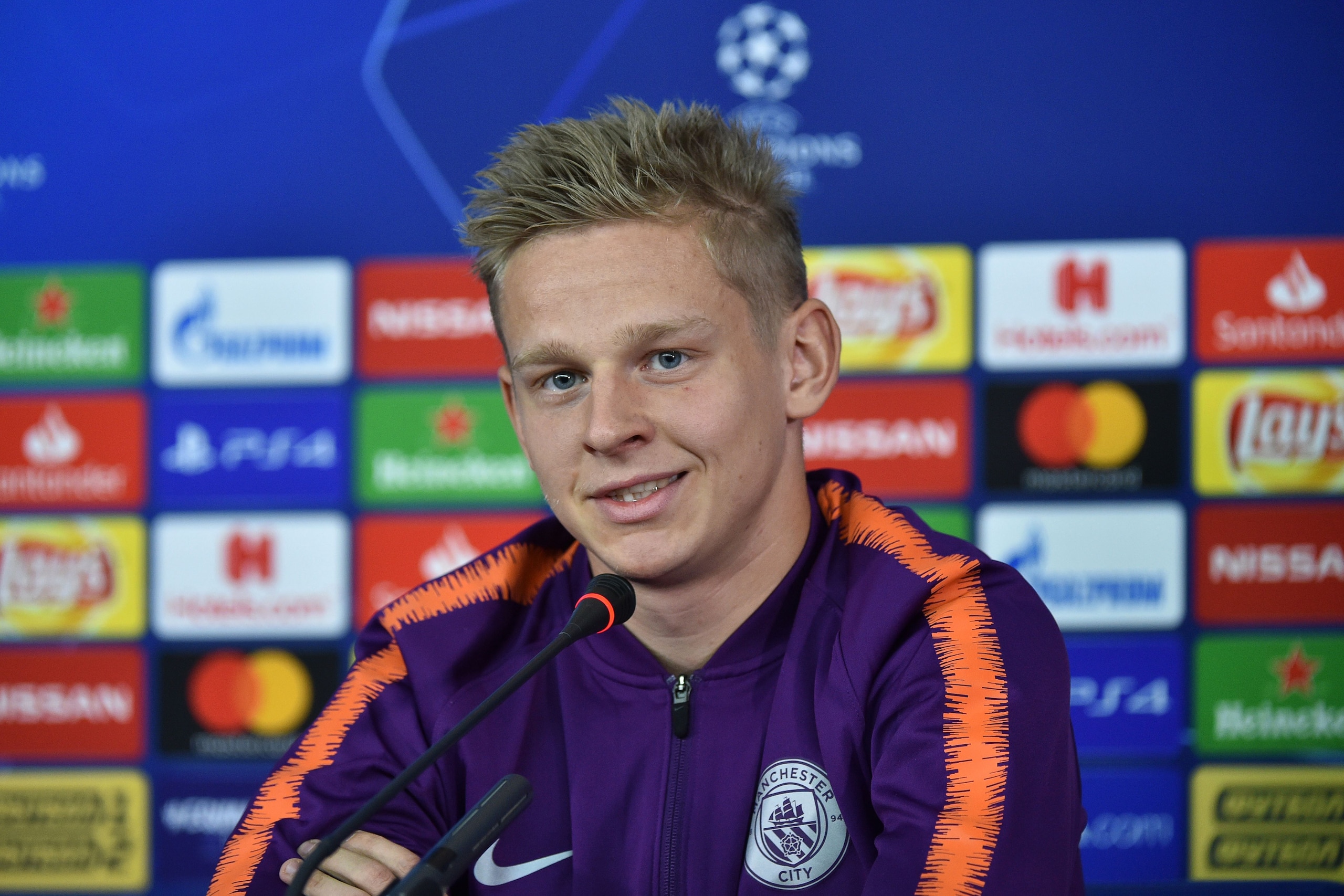 Manchester City's Ukrainian midfielder Oleksandr Zinchenko looks on during a press conference of Manchester City at the Metallist stadium in Kharkiv on October 22, 2018 on the eve of the UEFA Champion League Group F football match between Shakhtar Donetsk Manchester City's Ukrainian midfielder Oleksandr Zinchenko looks on during a press conference of Manchester City at the Metallist stadium in Kharkiv on October 22, 2018 on the eve of the UEFA Champion League Group F football match between Shakhtar Donetsk
