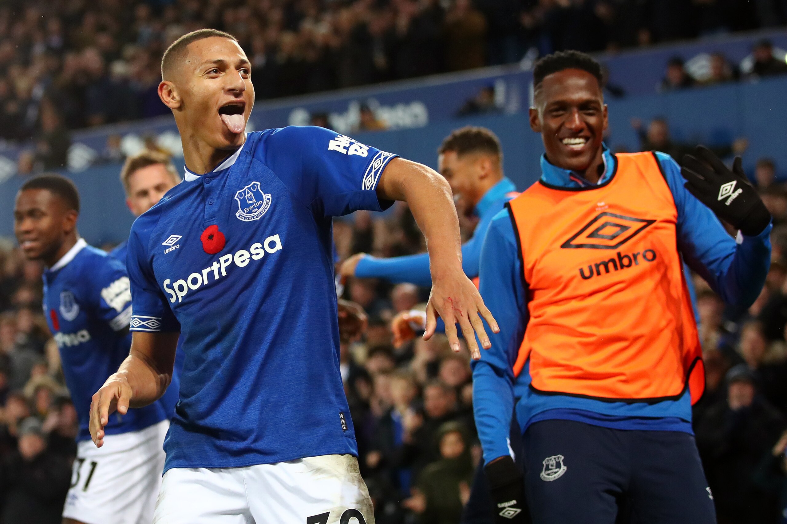 LIVERPOOL, ENGLAND - NOVEMBER 03:  Richarlison of Everton celebrates with teammates after he scores his sides third goal during the Premier League match between Everton FC and Brighton & Hove Albion at Goodison Park on November 3, 2018 in Liverpool, Unite