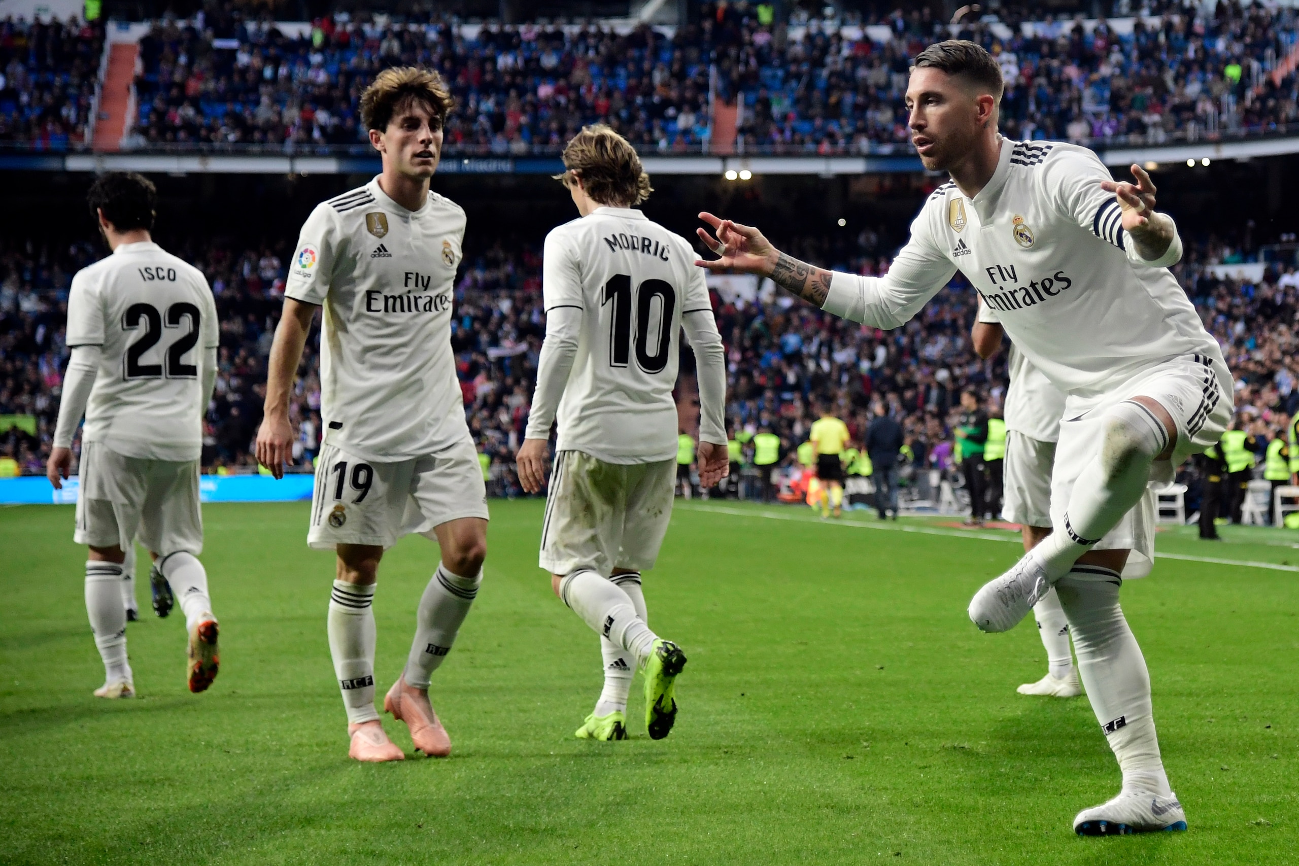 Real Madrid's Spanish defender Sergio Ramos celebrates scoring his team's second goal during the Spanish league football match between Real Madrid CF and Real Valladolid FC at the Santiago Bernabeu stadium in Madrid on November 3, 2018. (Photo by JAVIER S