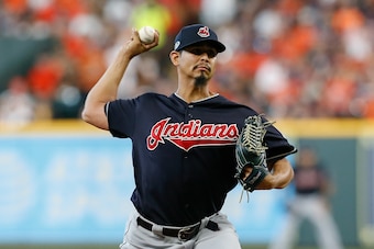 HOUSTON, TX - OCTOBER 06:  Carlos Carrasco #59 of the Cleveland Indians delivers a pitch in the first inning against the Houston Astros during Game Two of the American League Division Series at Minute Maid Park on October 6, 2018 in Houston, Texas.  (Phot