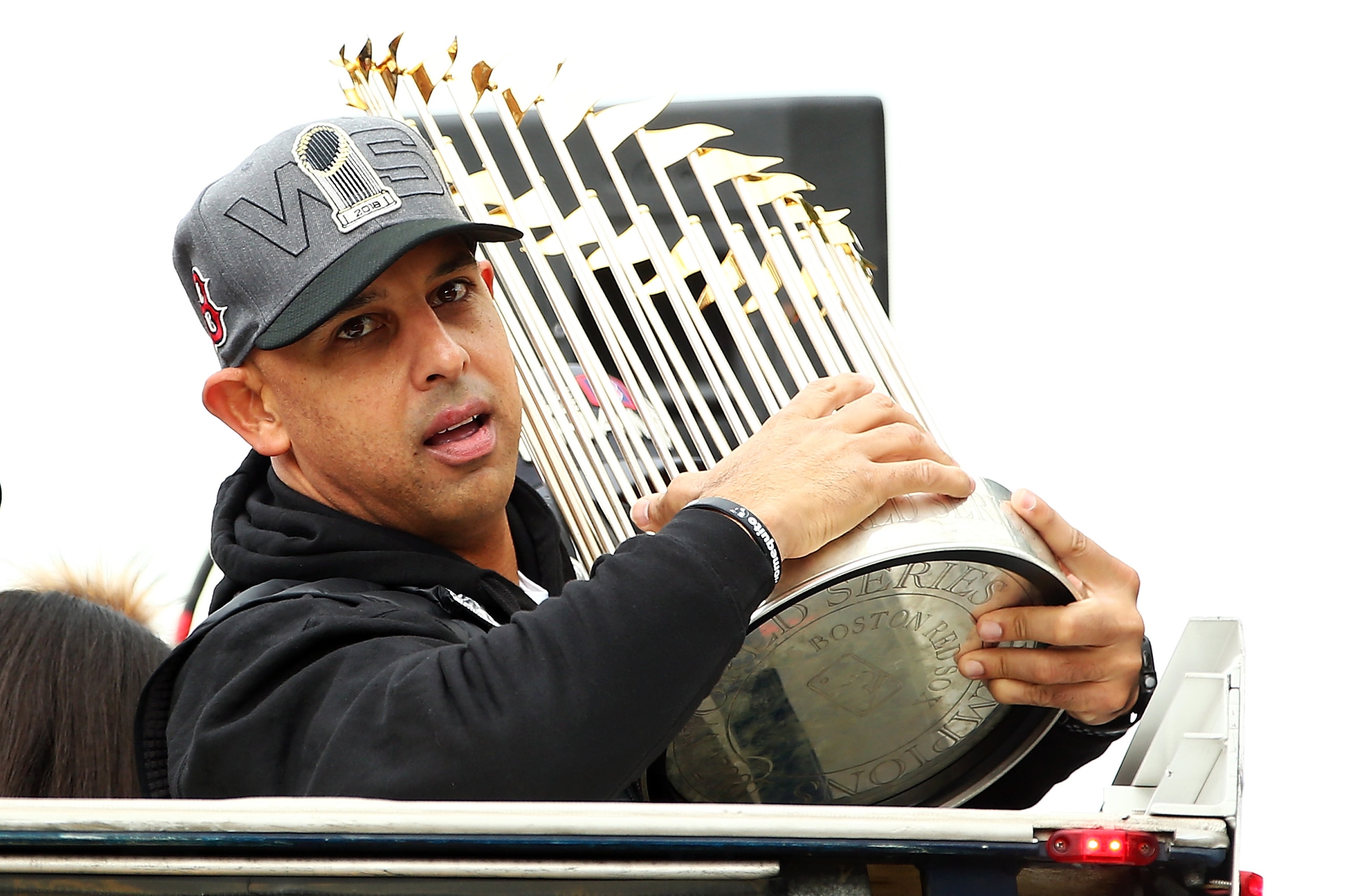 BOSTON, MA - OCTOBER 31:  Boston Red Sox Manager Alex Cora holds the World Series trophy during the 2018 World Series victory parade on October 31, 2018 in Boston, Massachusetts. (Photo by Adam Glanzman/Getty Images)