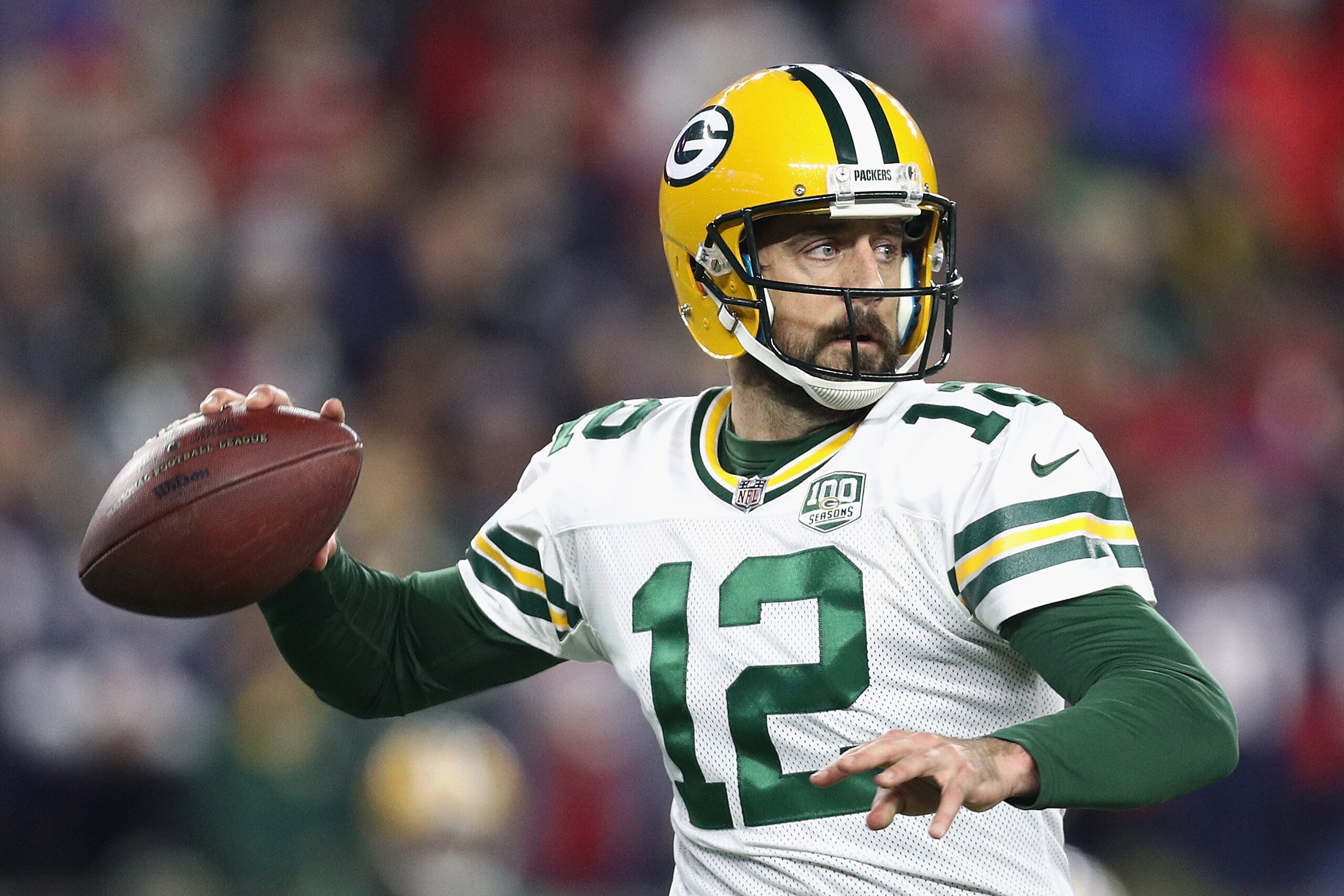 FOXBOROUGH, MA - NOVEMBER 04:  Aaron Rodgers #12 of the Green Bay Packers looks to pass the ball during the second half against the New England Patriots at Gillette Stadium on November 4, 2018 in Foxborough, Massachusetts.  (Photo by Maddie Meyer/Getty Im