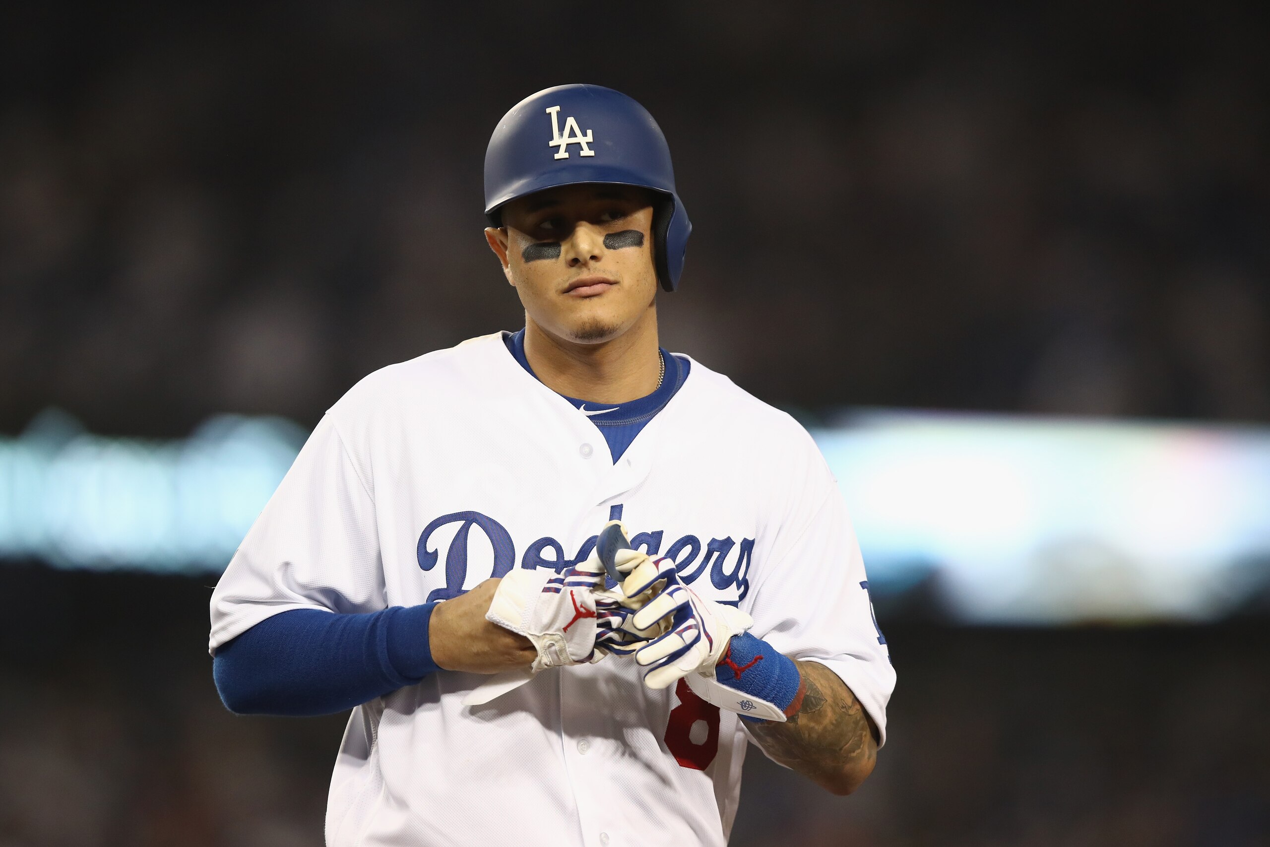 LOS ANGELES, CA - OCTOBER 26:  Manny Machado #8 of the Los Angeles Dodgers reacts after flying out during the tenth inning against the Boston Red Sox in Game Three of the 2018 World Series at Dodger Stadium on October 26, 2018 in Los Angeles, California. 