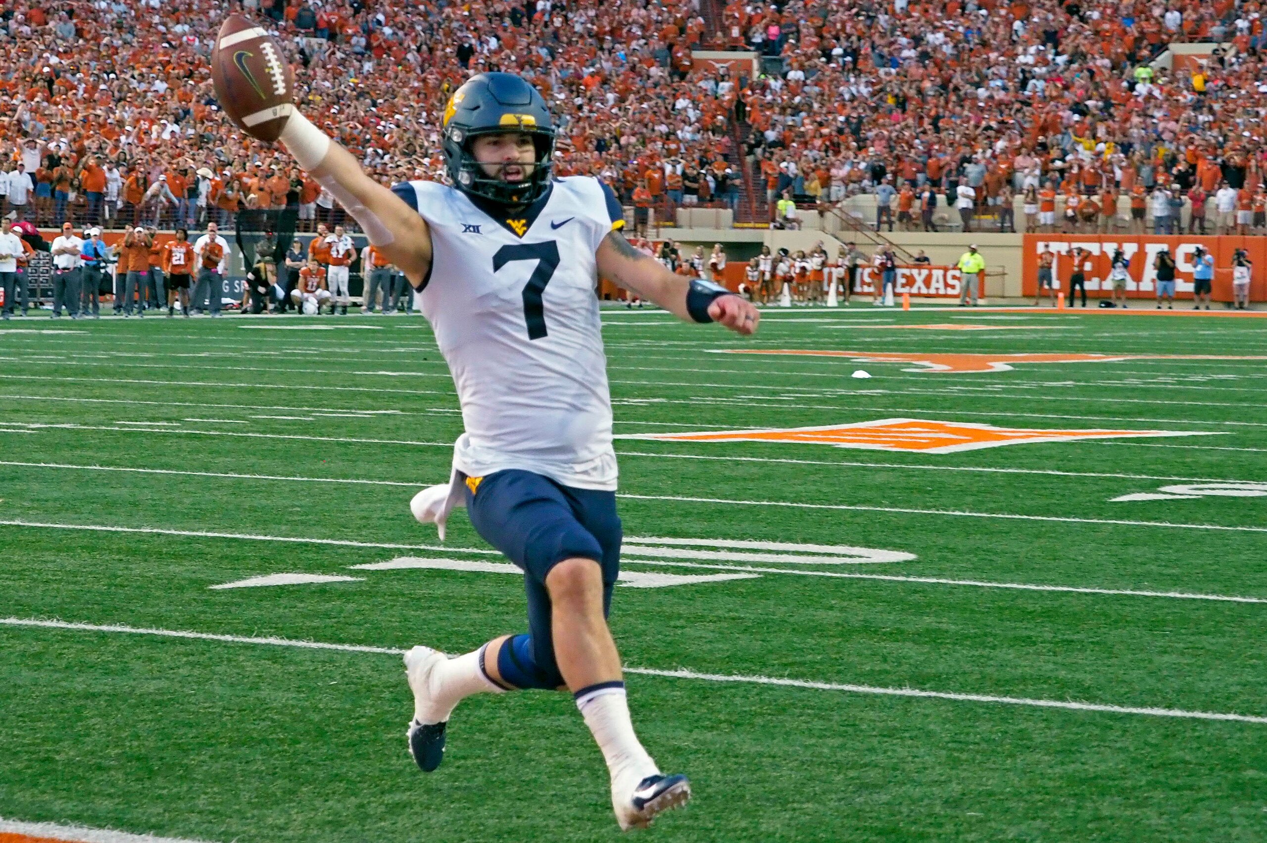 Will Grier races into the end zone for game-winning two-point conversion in 42-41 win over Texas.