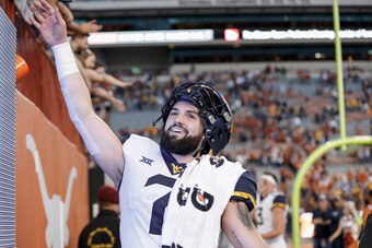 AUSTIN, TX - NOVEMBER 03:  Will Grier #7 of the West Virginia Mountaineers celebrates after the game against the Texas Longhorns at Darrell K Royal-Texas Memorial Stadium on November 3, 2018 in Austin, Texas.  (Photo by Tim Warner/Getty Images)