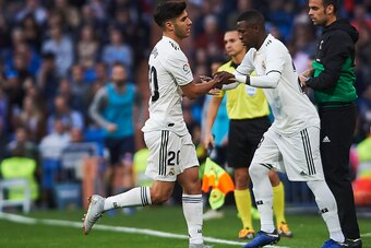 MADRID, SPAIN - NOVEMBER 03:  Marco Asensio and Vinicius Junior of Real Madrid look on during the La Liga match between Real Madrid CF and Real Valladolid CF at Estadio Santiago Bernabeu on November 3, 2018 in Madrid, Spain.  (Photo by Quality Sport Image