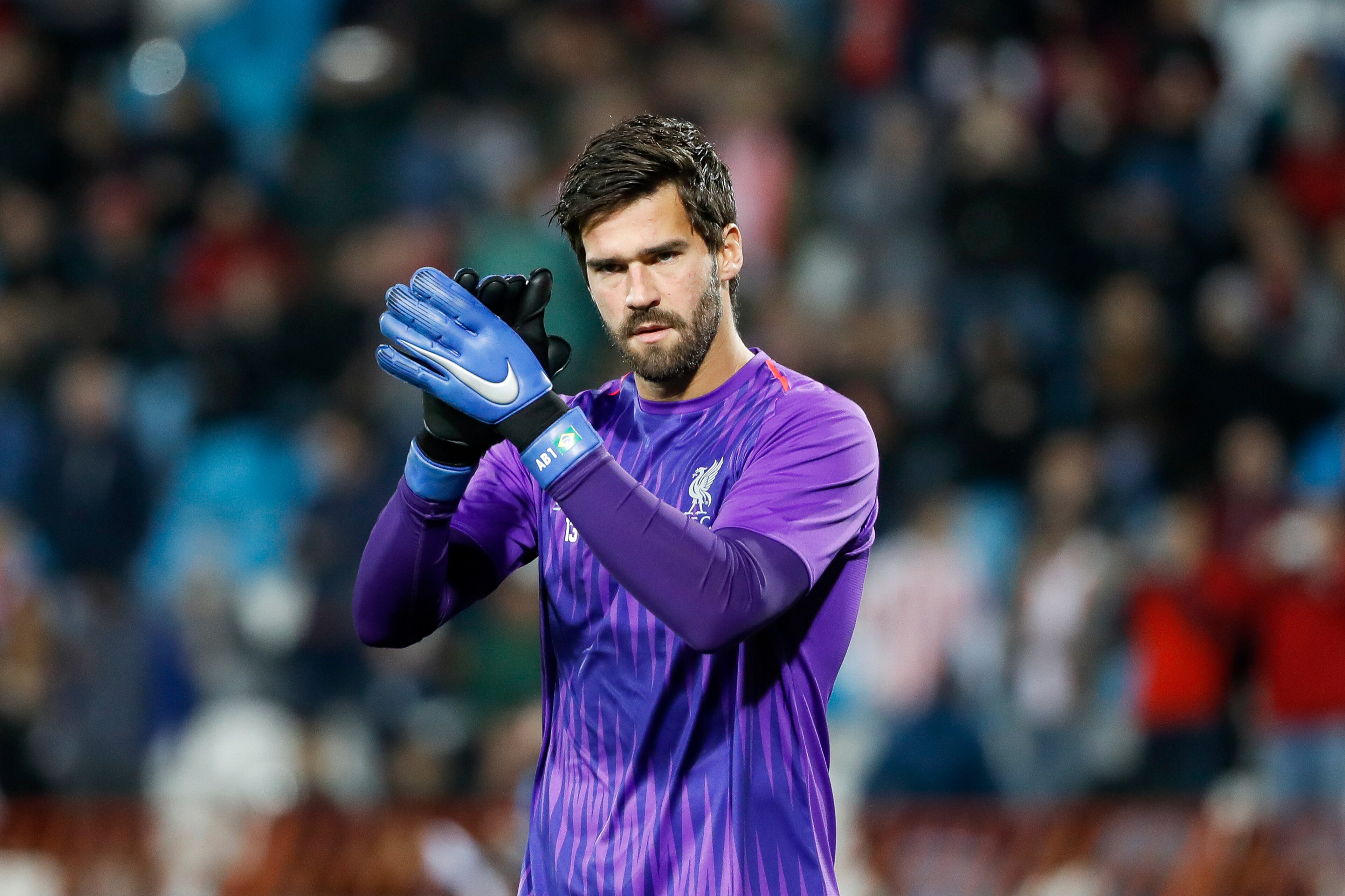 BELGRADE, SERBIA - NOVEMBER 06: Alisson Becker of Liverpool warm-up prior to the Group C match of the UEFA Champions League between Red Star Belgrade and Liverpool at Rajko Mitic Stadium on November 06, 2018 in Belgrade, Serbia. (Photo by Srdjan Stevanovi